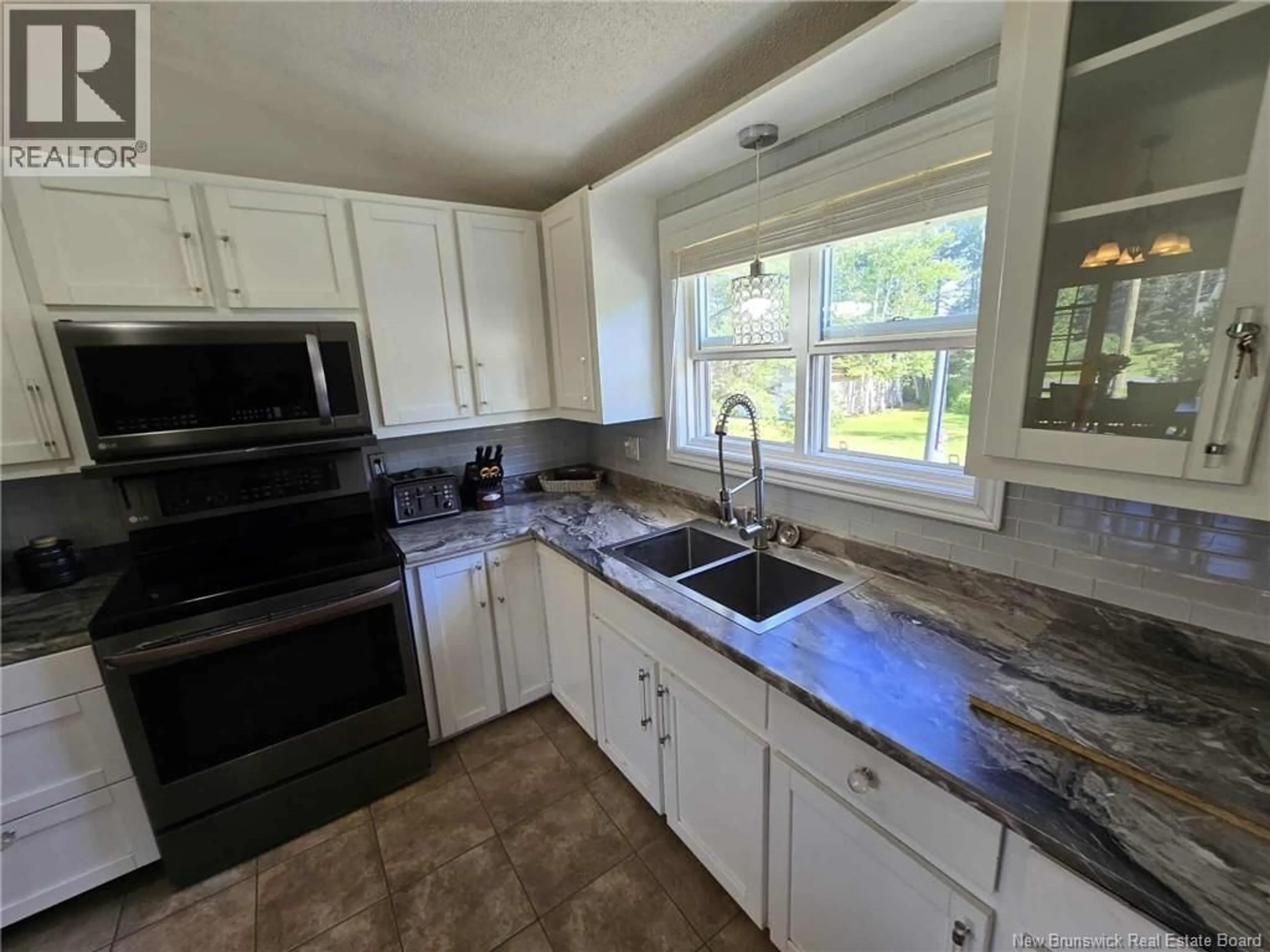 Standard kitchen, ceramic/tile floor for 363 HERITAGE STREET, Beresford New Brunswick E8K2C7