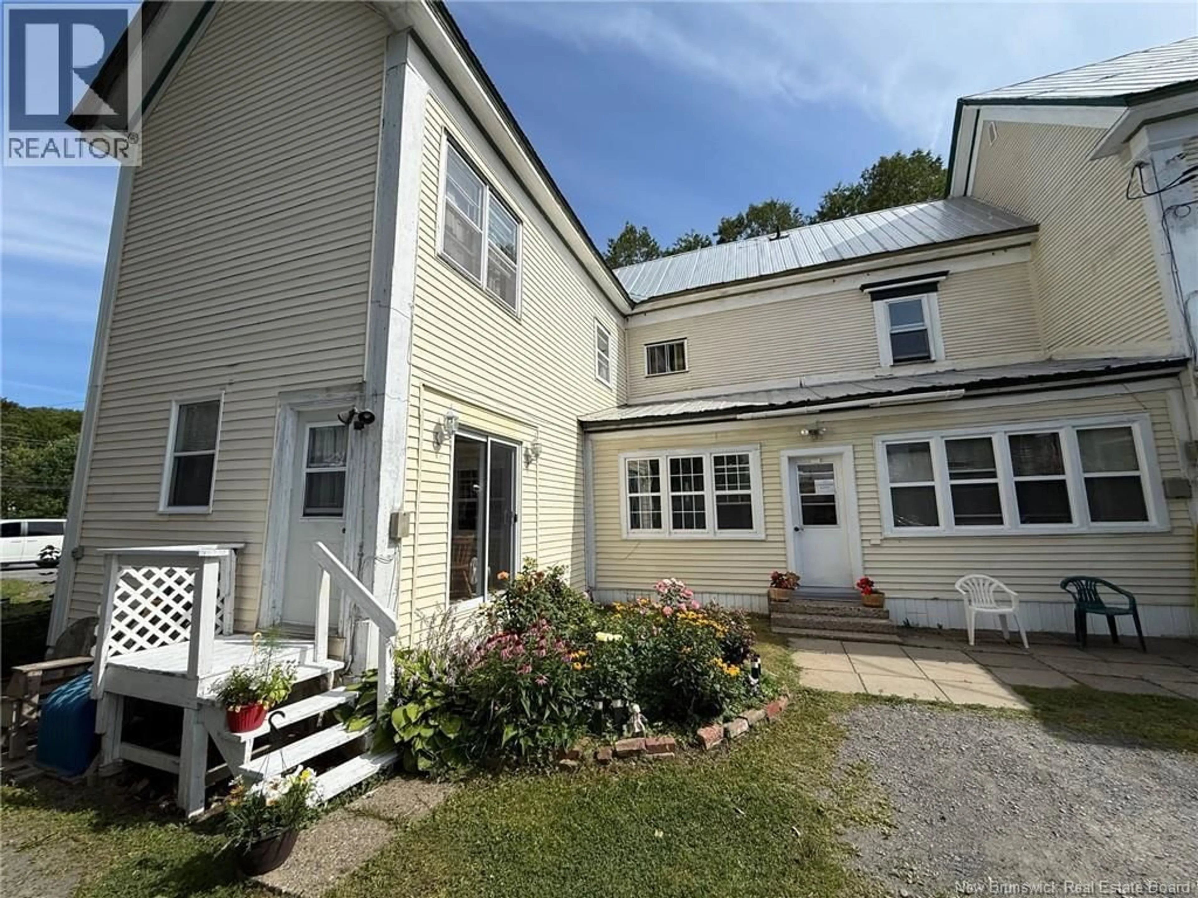 A pic from outside/outdoor area/front of a property/back of a property/a pic from drone, street for 108 DIVISION STREET, Woodstock New Brunswick E7M1P3