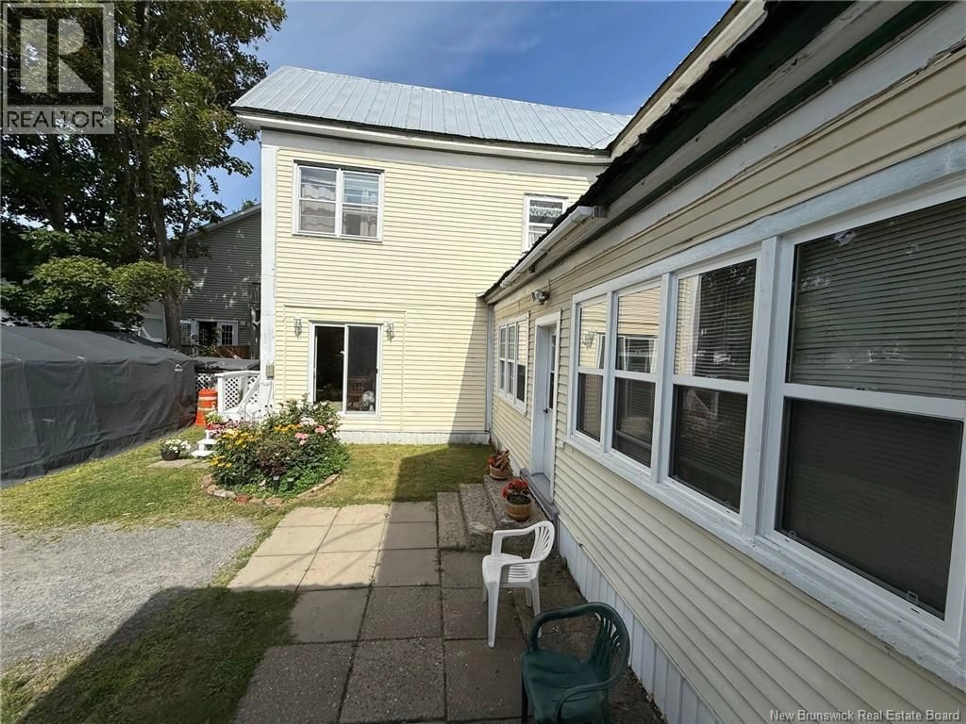 A pic from outside/outdoor area/front of a property/back of a property/a pic from drone, street for 108 DIVISION STREET, Woodstock New Brunswick E7M1P3