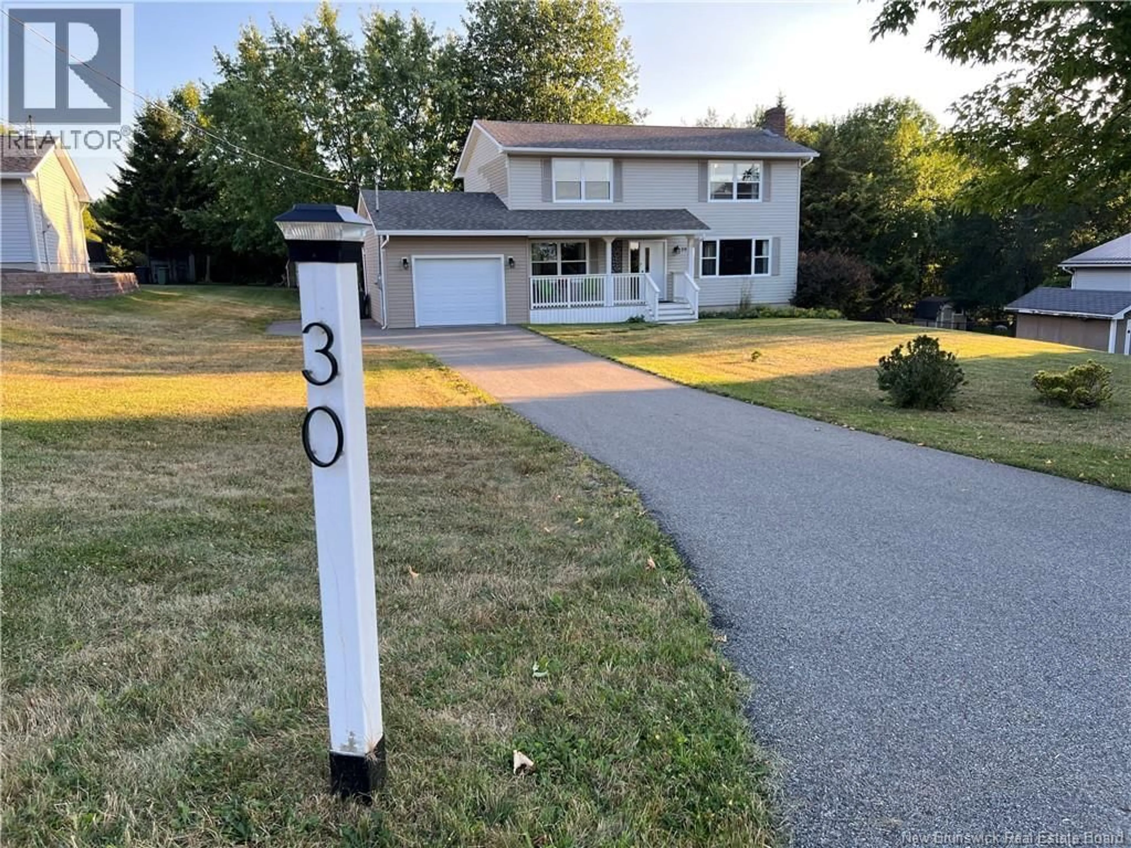 Home with vinyl exterior material, street for 30 SAUNDERS DRIVE, Quispamsis New Brunswick E2E1J7