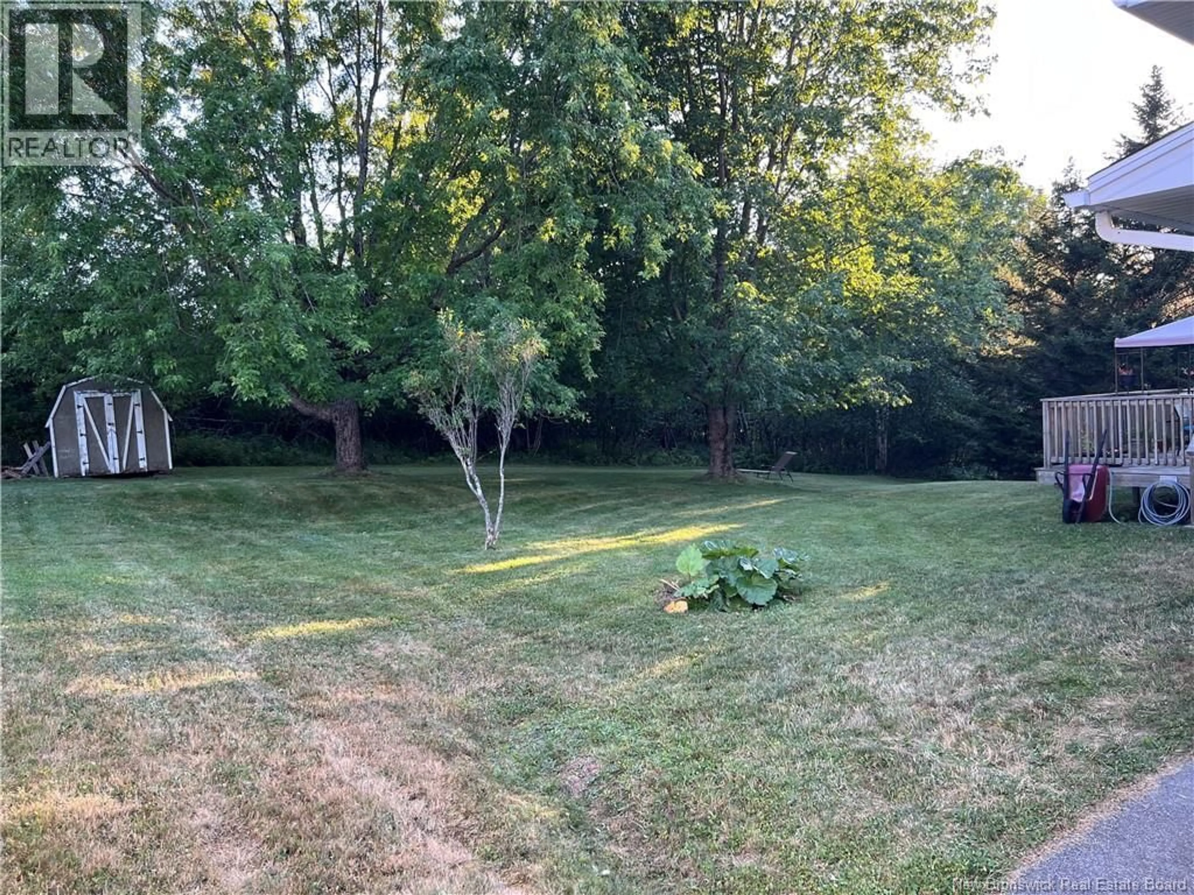 A pic from outside/outdoor area/front of a property/back of a property/a pic from drone, forest/trees view for 30 SAUNDERS DRIVE, Quispamsis New Brunswick E2E1J7