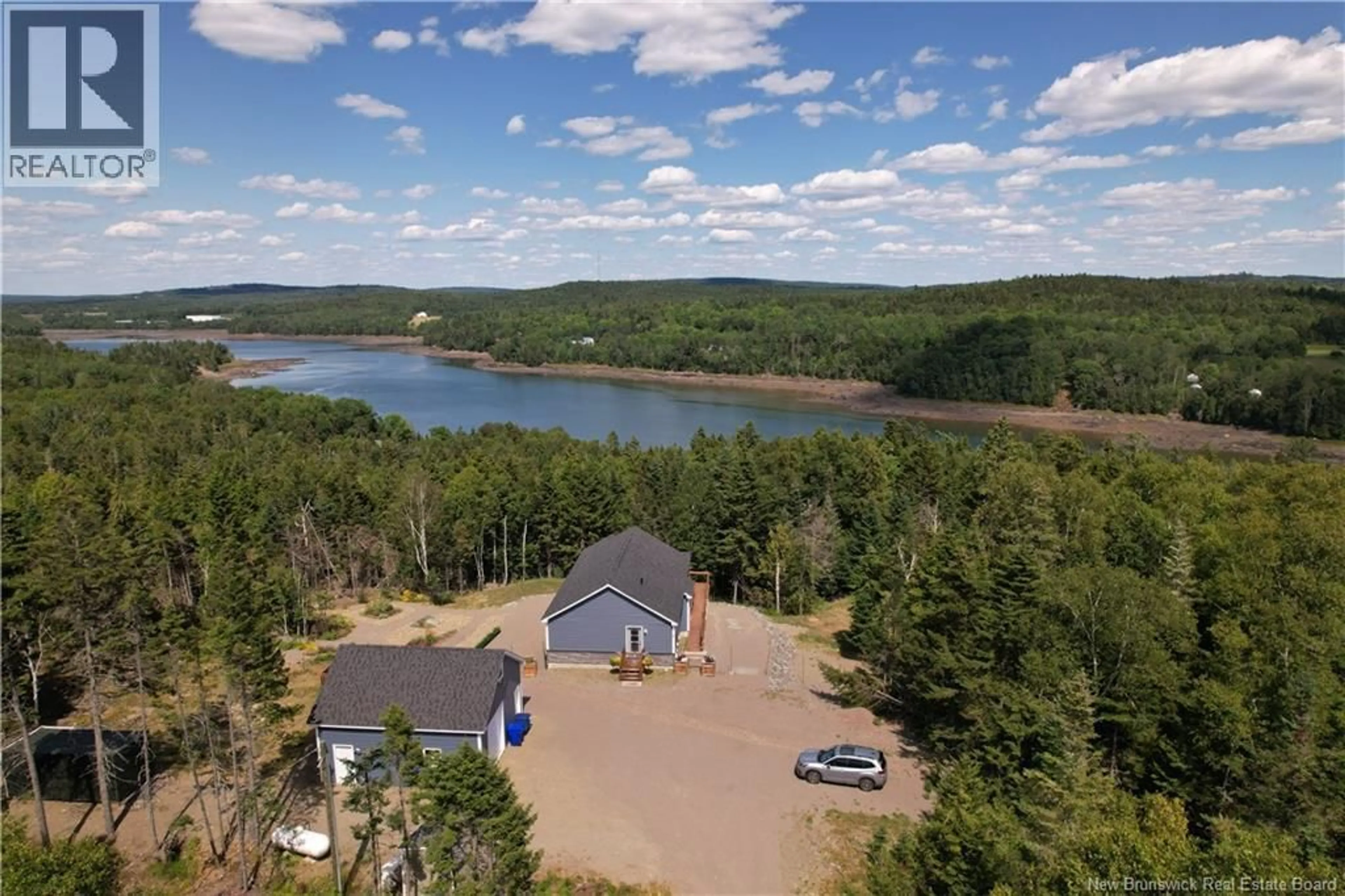 A pic from outside/outdoor area/front of a property/back of a property/a pic from drone, water/lake/river/ocean view for 393 HILLS POINT ROAD, Oak Bay New Brunswick E3L4J9