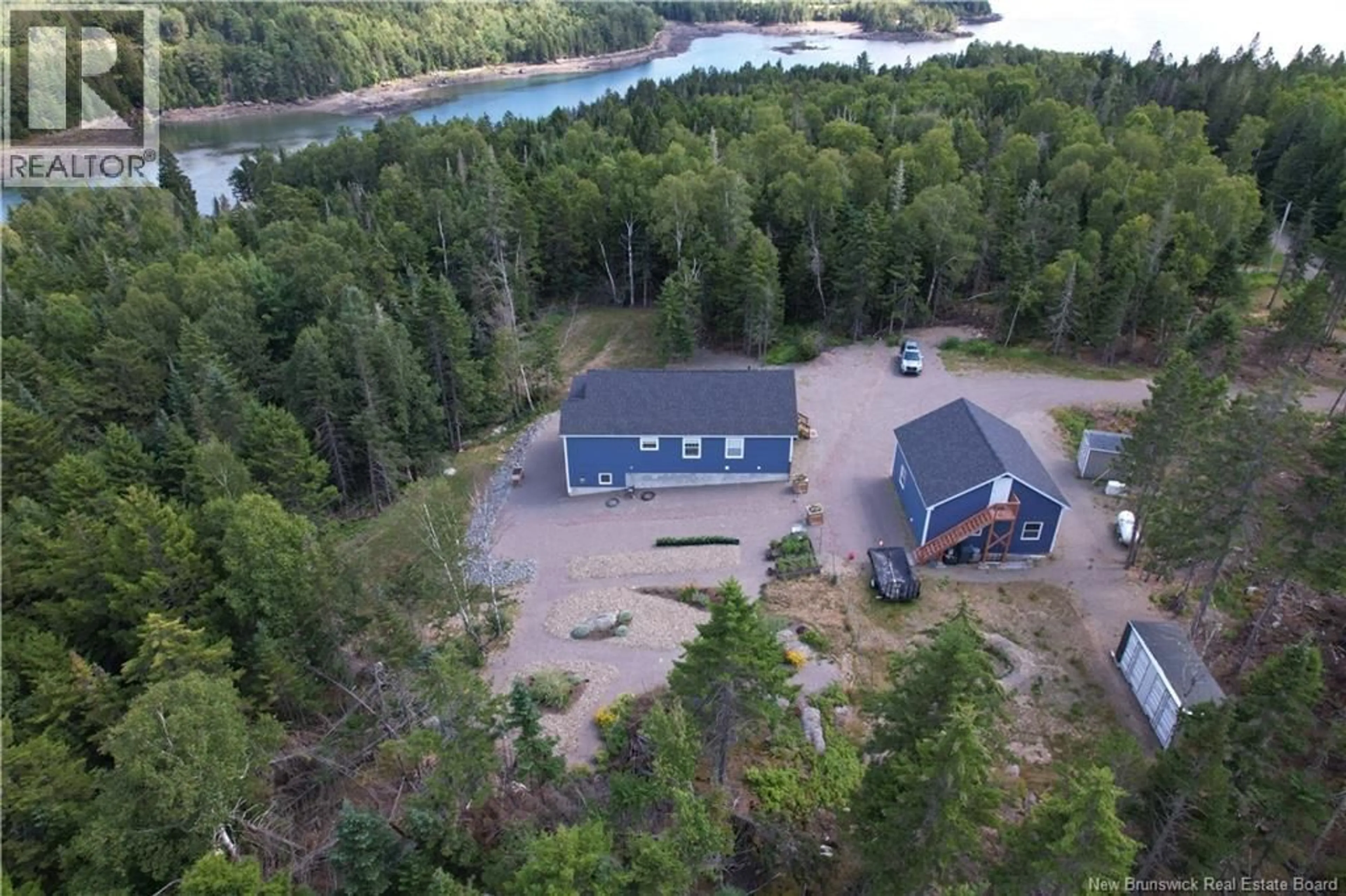 A pic from outside/outdoor area/front of a property/back of a property/a pic from drone, water/lake/river/ocean view for 393 HILLS POINT ROAD, Oak Bay New Brunswick E3L4J9