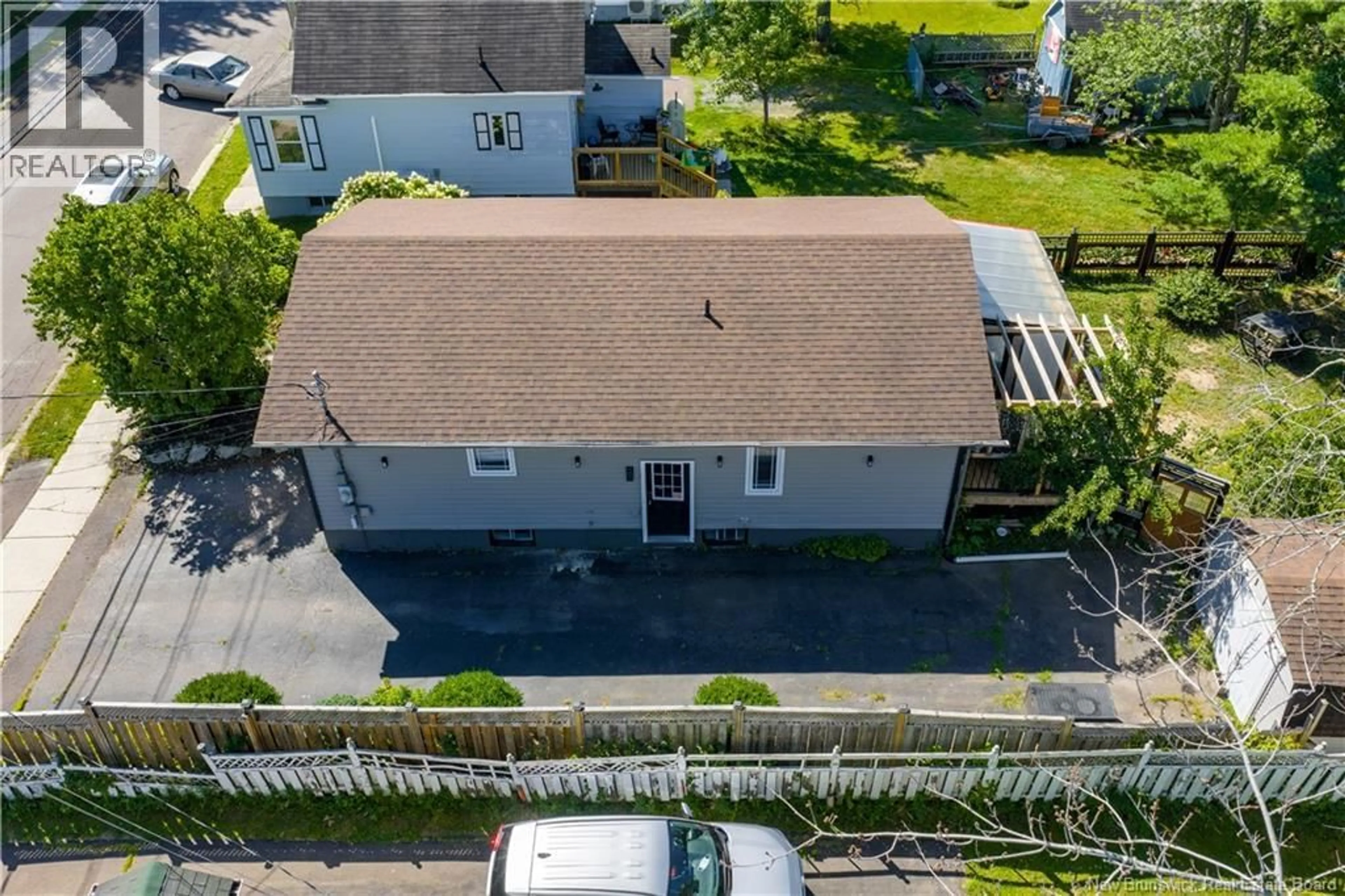 A pic from outside/outdoor area/front of a property/back of a property/a pic from drone, street for 98 CEDAR STREET, Moncton New Brunswick E1C7L4