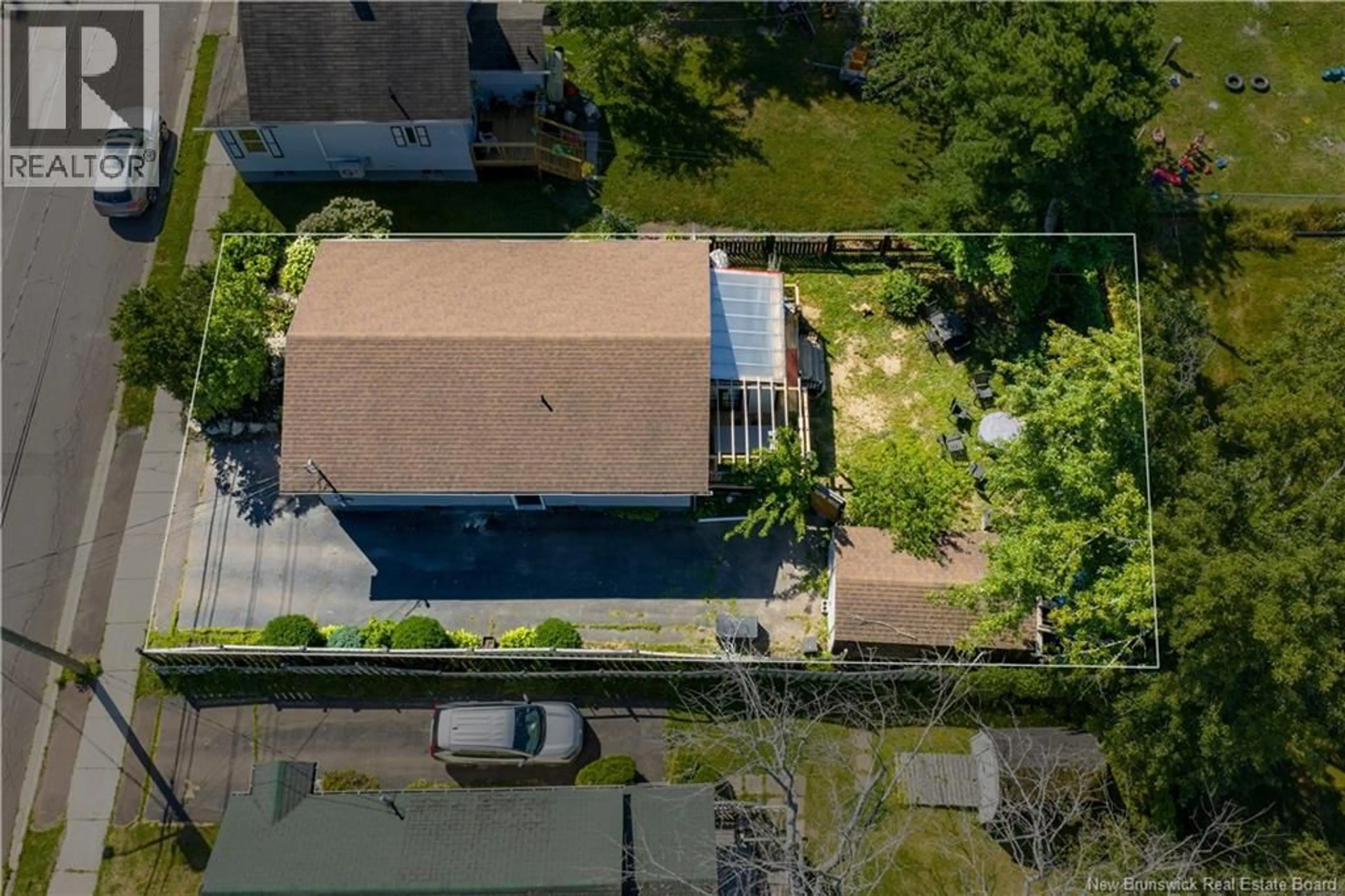 A pic from outside/outdoor area/front of a property/back of a property/a pic from drone, street for 98 CEDAR STREET, Moncton New Brunswick E1C7L4