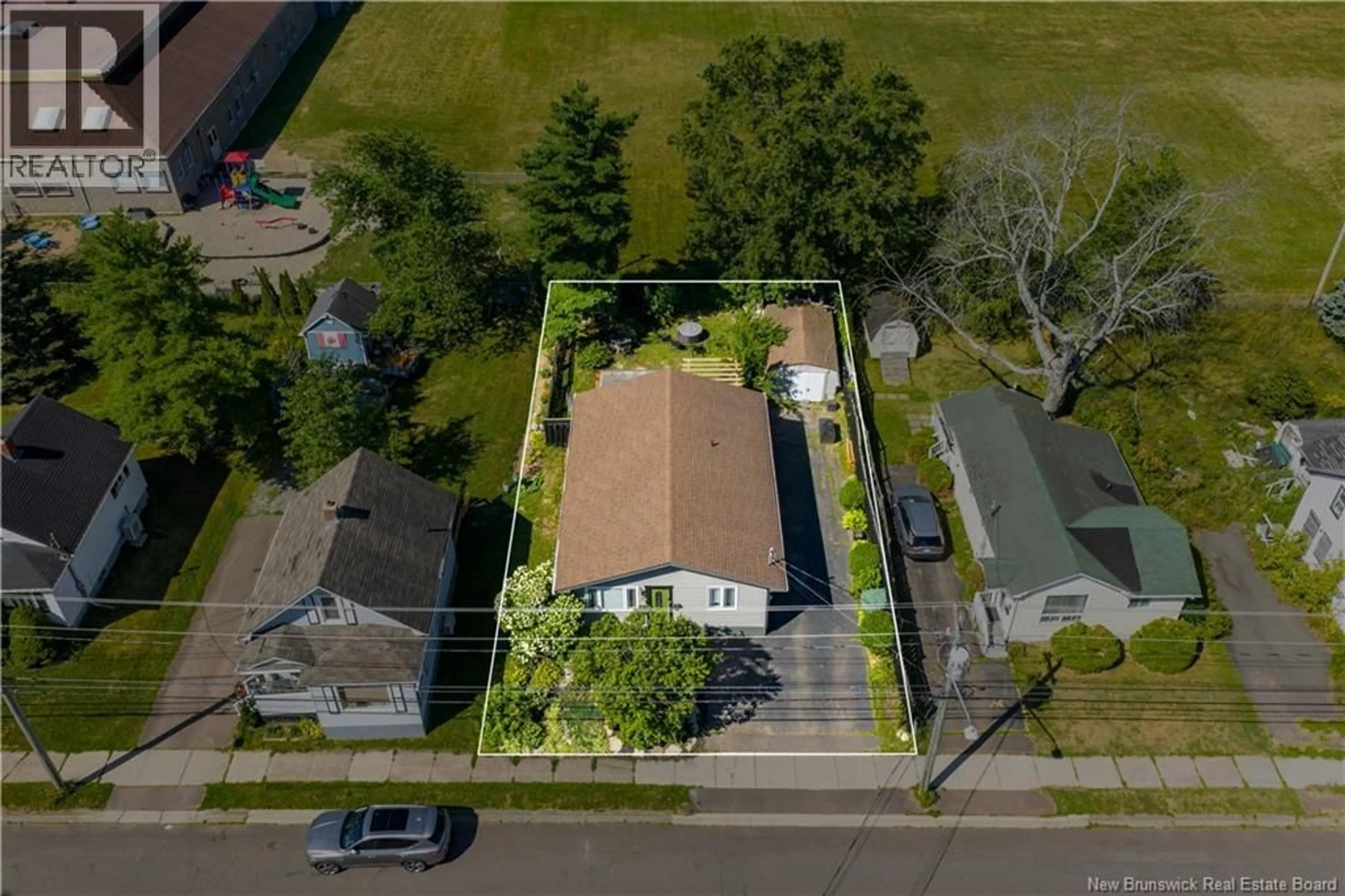 A pic from outside/outdoor area/front of a property/back of a property/a pic from drone, street for 98 CEDAR STREET, Moncton New Brunswick E1C7L4