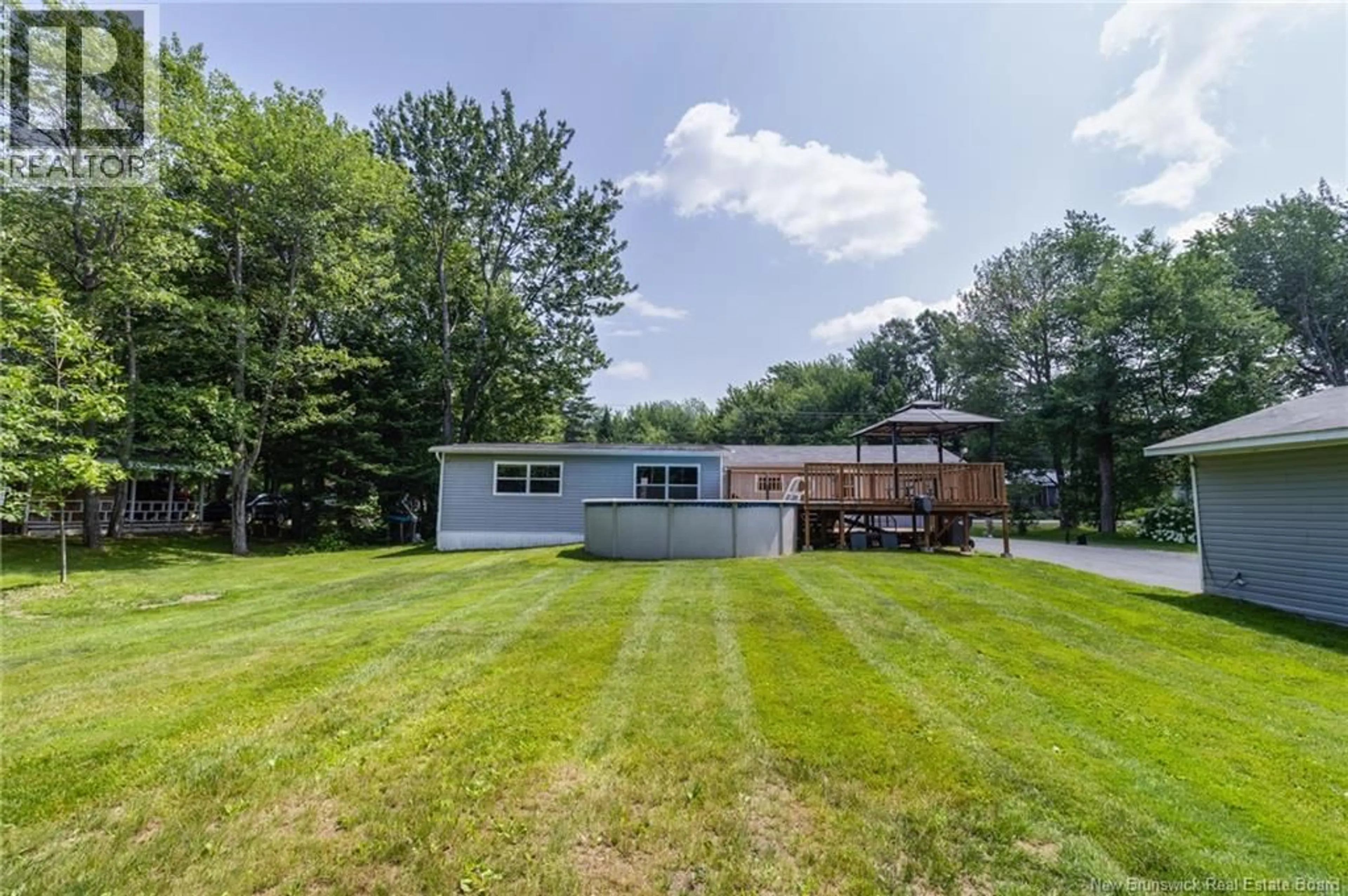 A pic from outside/outdoor area/front of a property/back of a property/a pic from drone, water/lake/river/ocean view for 30 NEVERS, Lincoln New Brunswick E3B8R9
