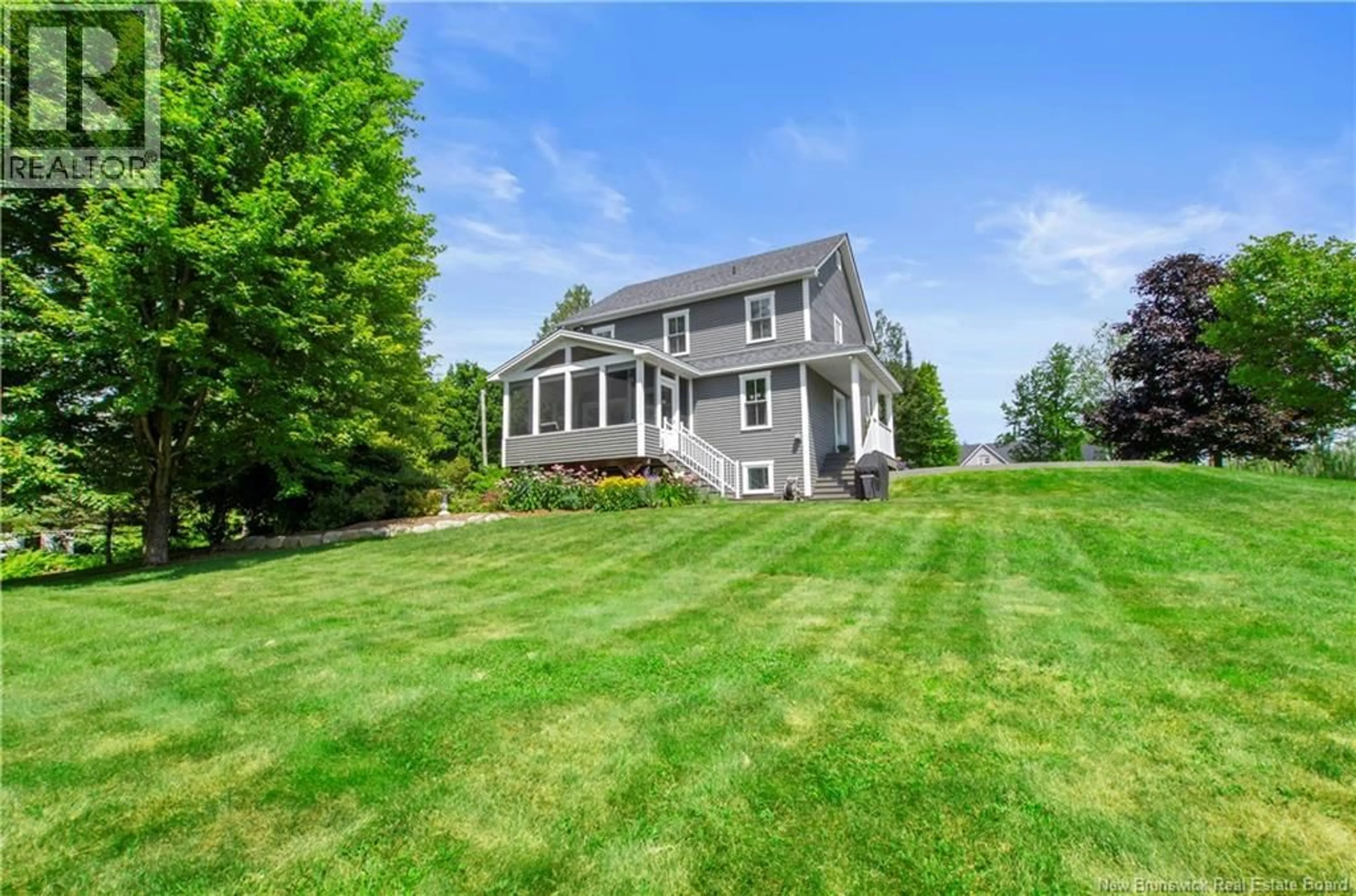 A pic from outside/outdoor area/front of a property/back of a property/a pic from drone, water/lake/river/ocean view for 20 JEANS LANE, Maugerville New Brunswick E3A8M2