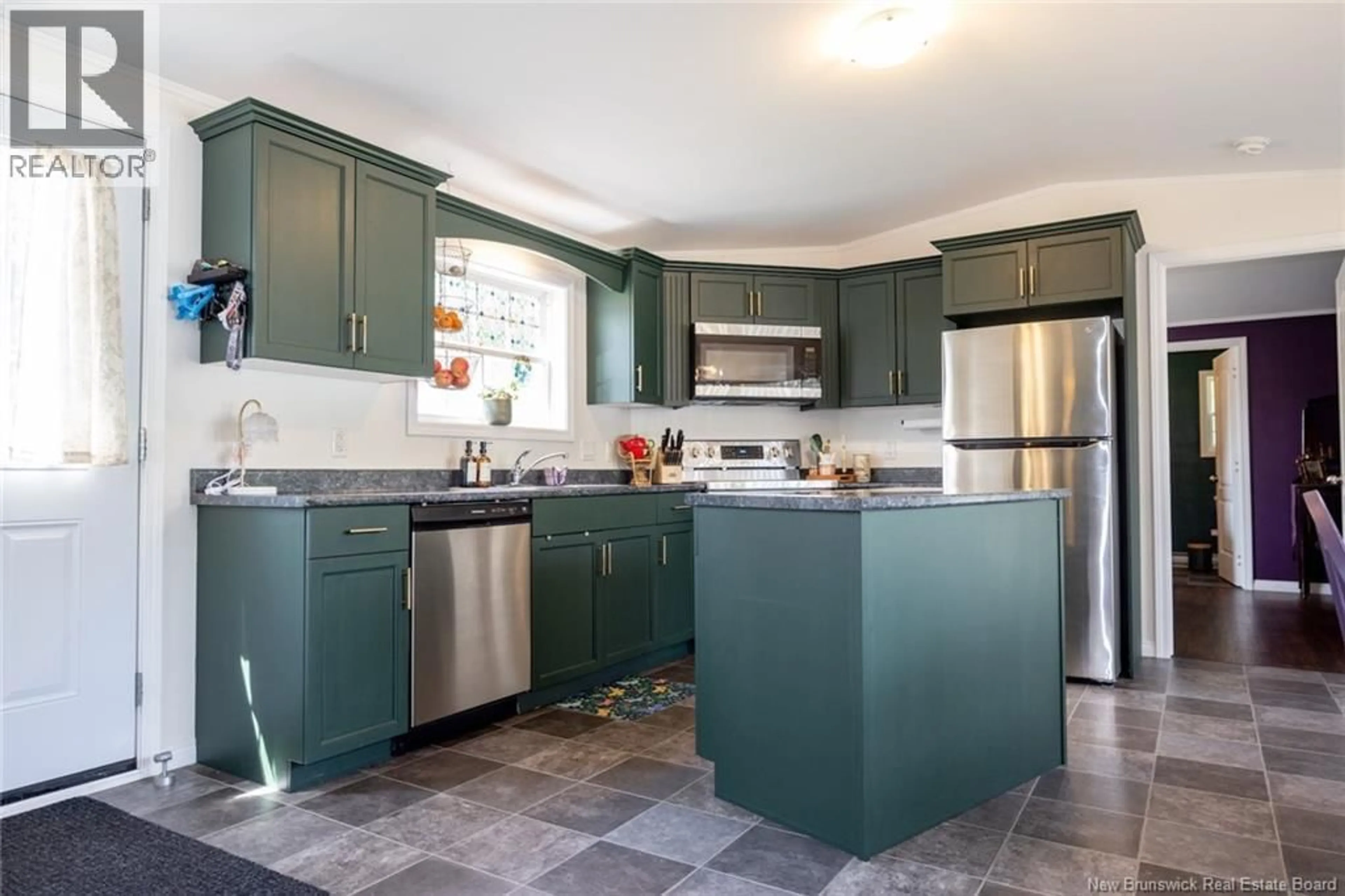 Open concept kitchen, ceramic/tile floor for 91 NORTHWOOD STREET, Fredericton New Brunswick E3B6R4