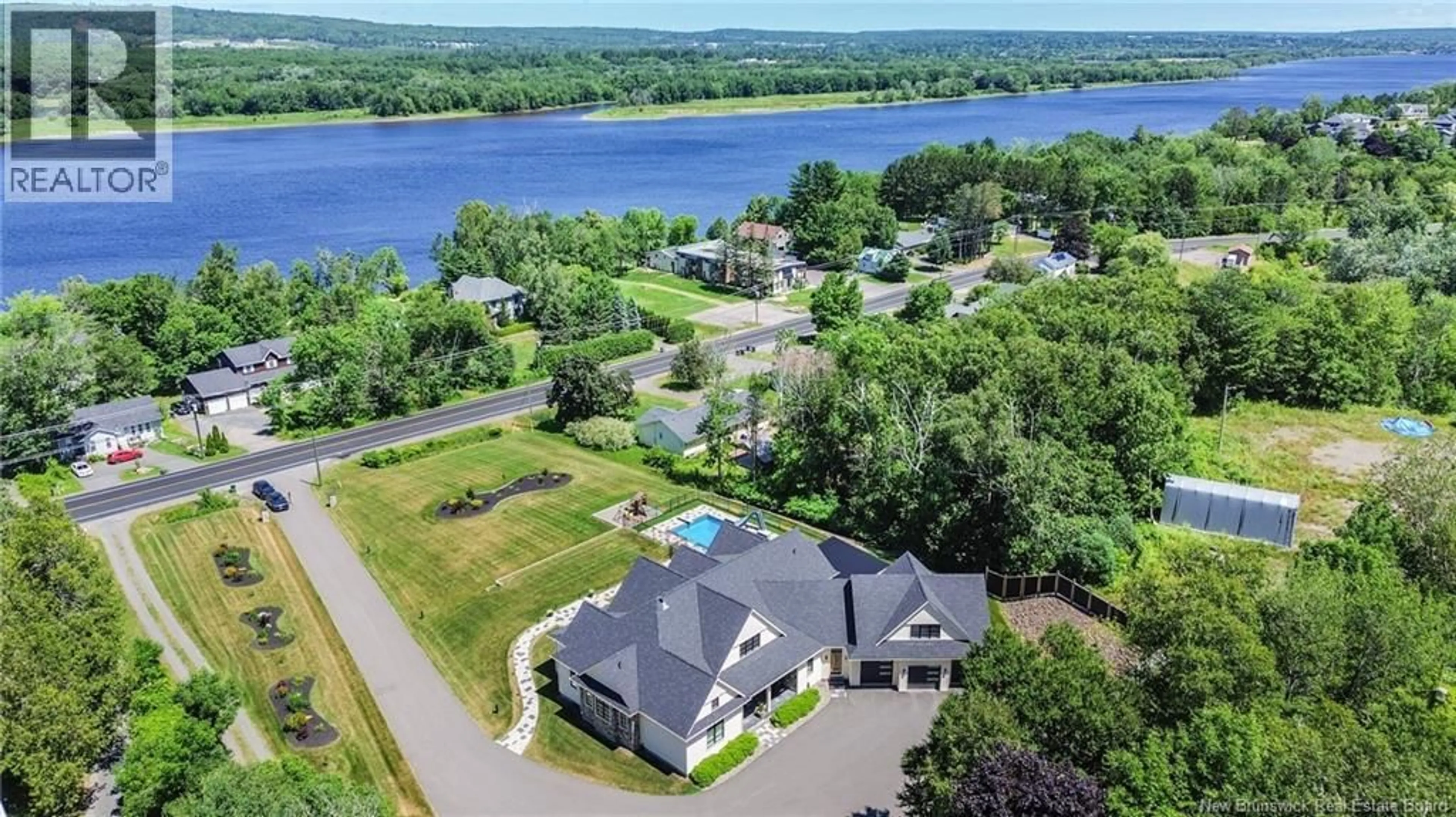 A pic from outside/outdoor area/front of a property/back of a property/a pic from drone, water/lake/river/ocean view for 1520 WOODSTOCK ROAD, Fredericton New Brunswick E3C1P3