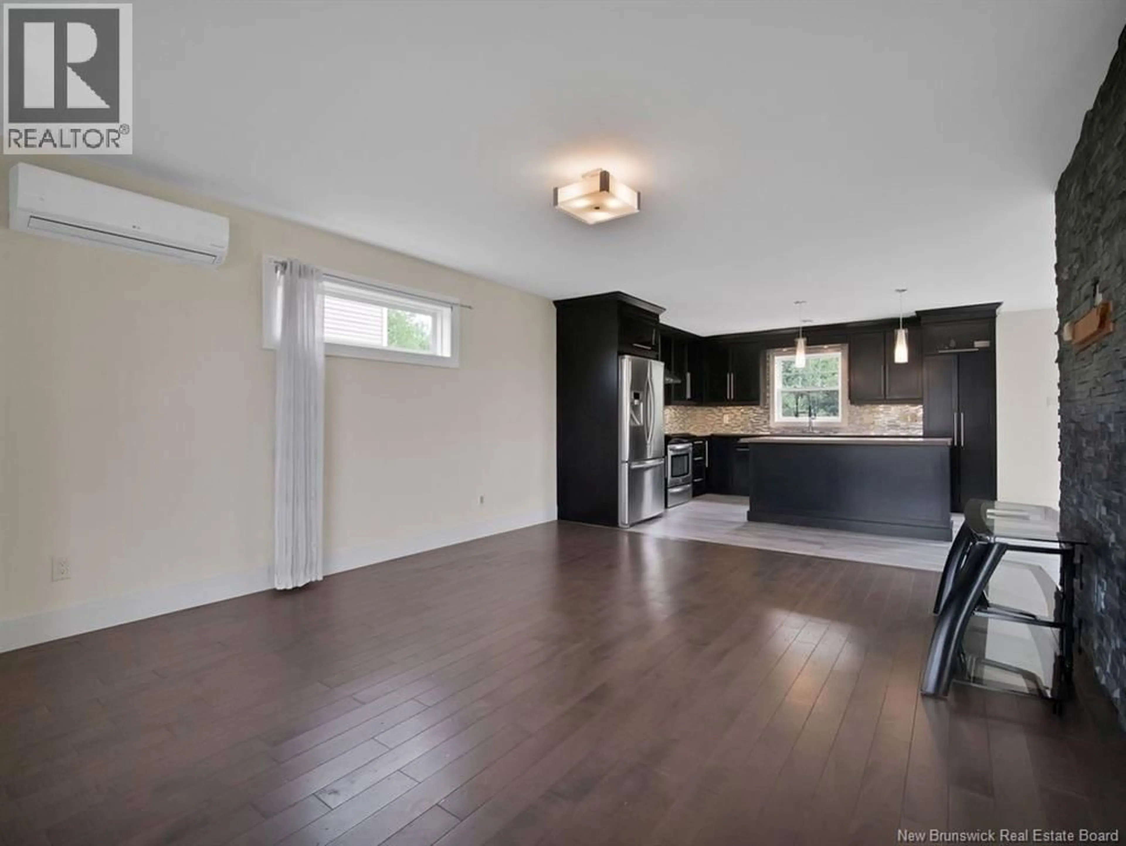 Open concept kitchen, wood/laminate floor for 276 LADY RUSSEL STREET, Moncton New Brunswick E1E4W6