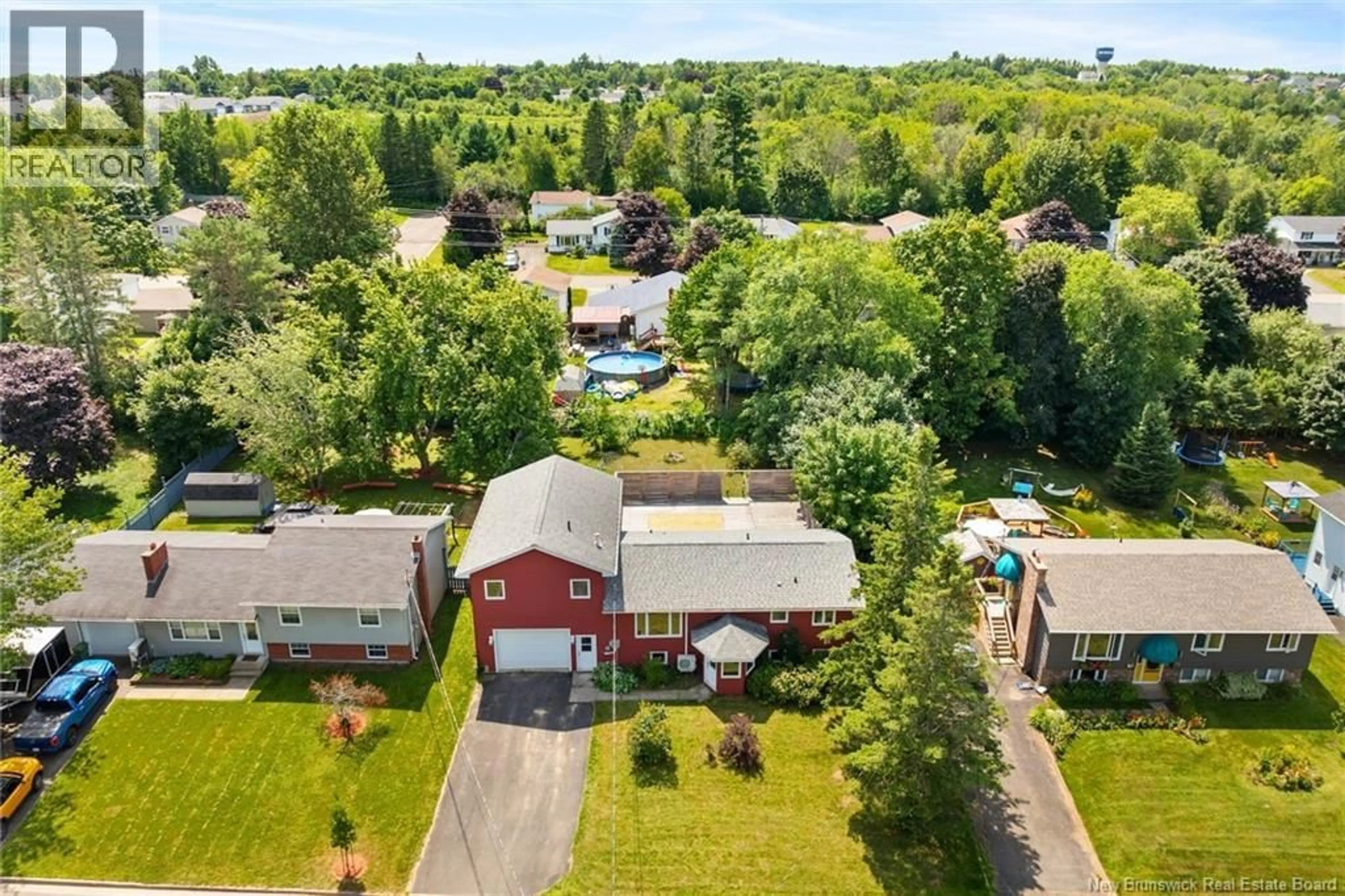 A pic from outside/outdoor area/front of a property/back of a property/a pic from drone, street for 73 MACINTOSH DRIVE, New Maryland New Brunswick E3C1B5