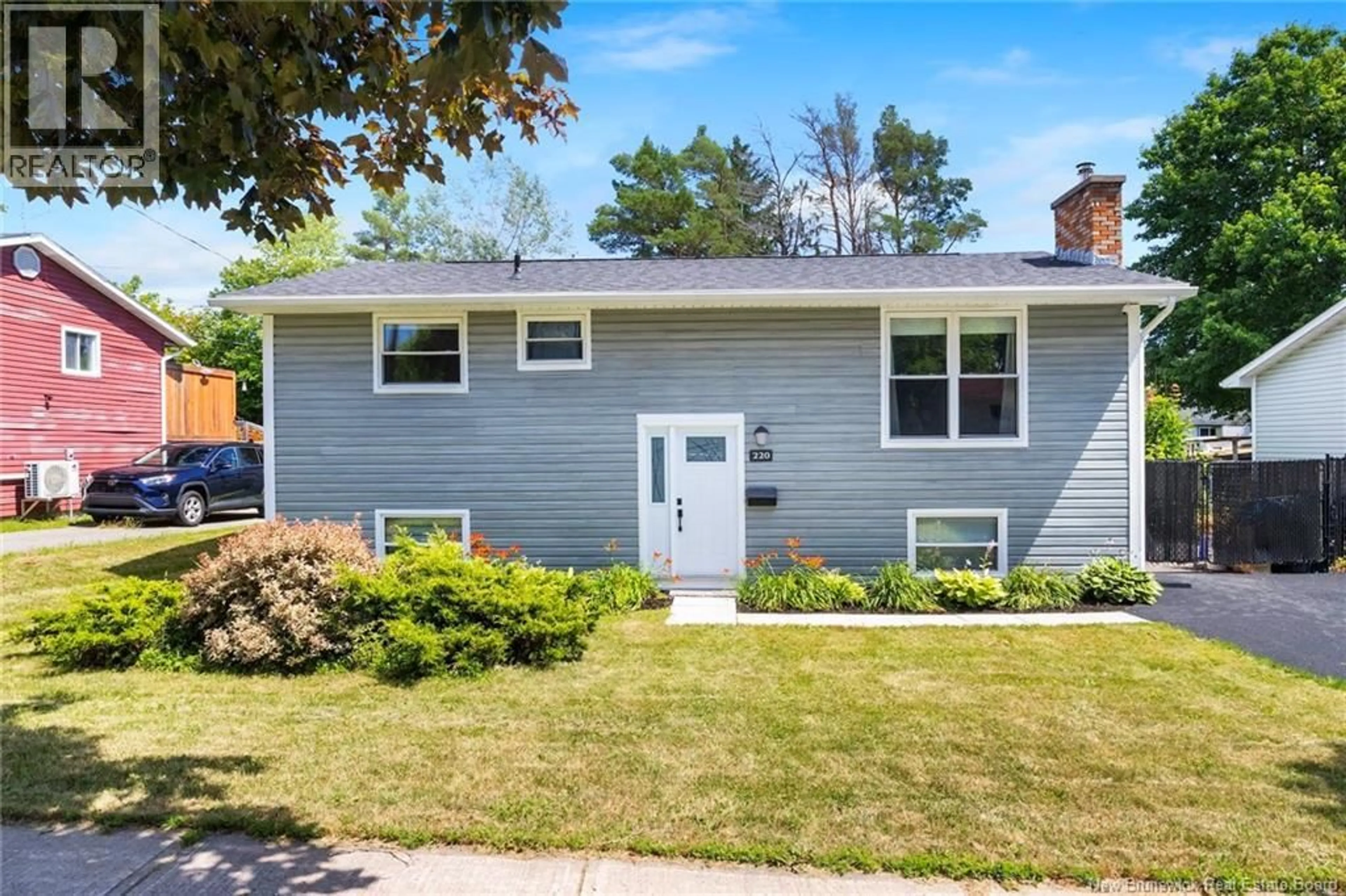 Home with vinyl exterior material, street for 220 MCKEEN STREET, Fredericton New Brunswick E3A2R1