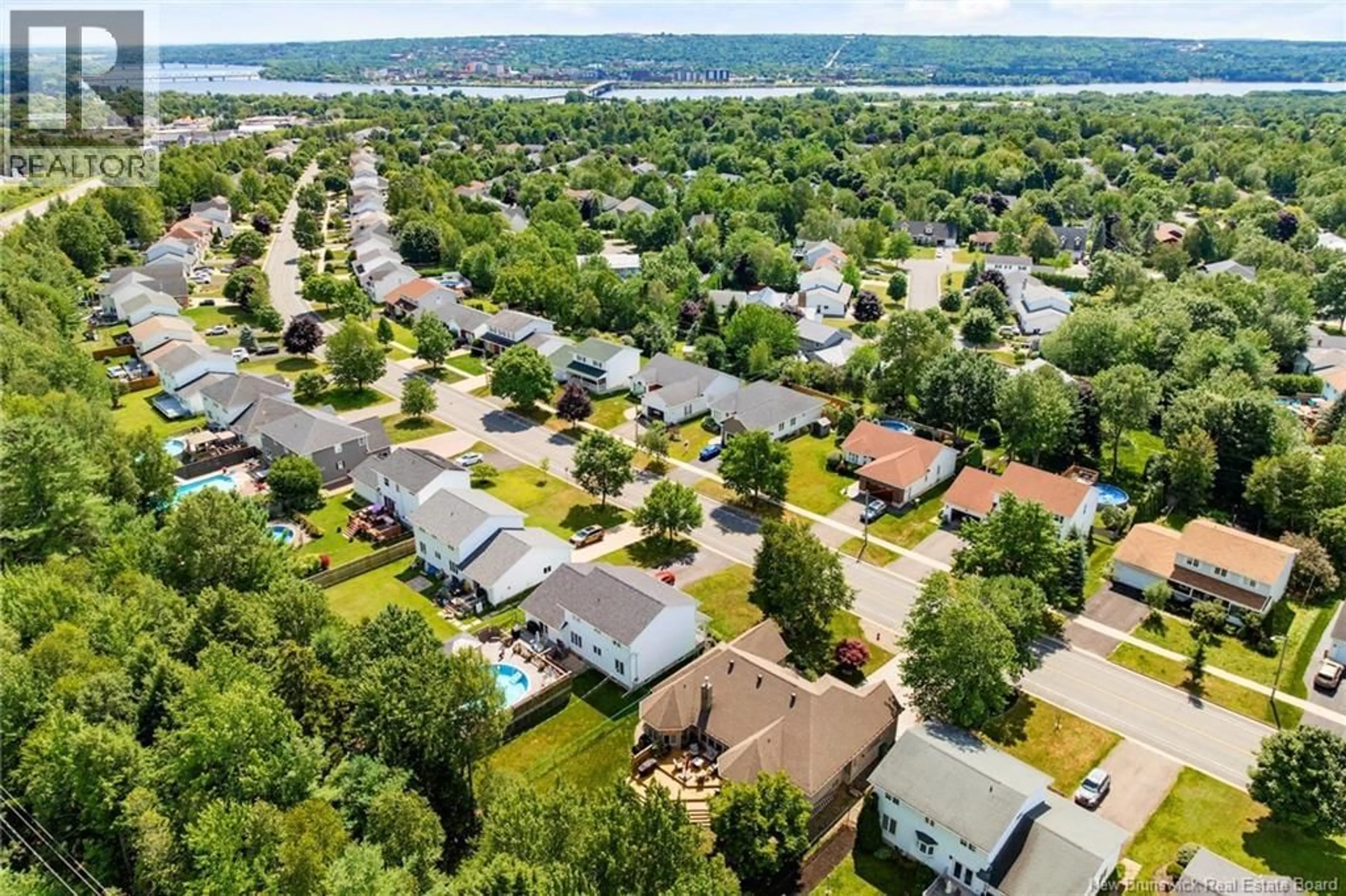 A pic from outside/outdoor area/front of a property/back of a property/a pic from drone, water/lake/river/ocean view for 576 DOUGLAS AVENUE, Fredericton New Brunswick E3A5T1