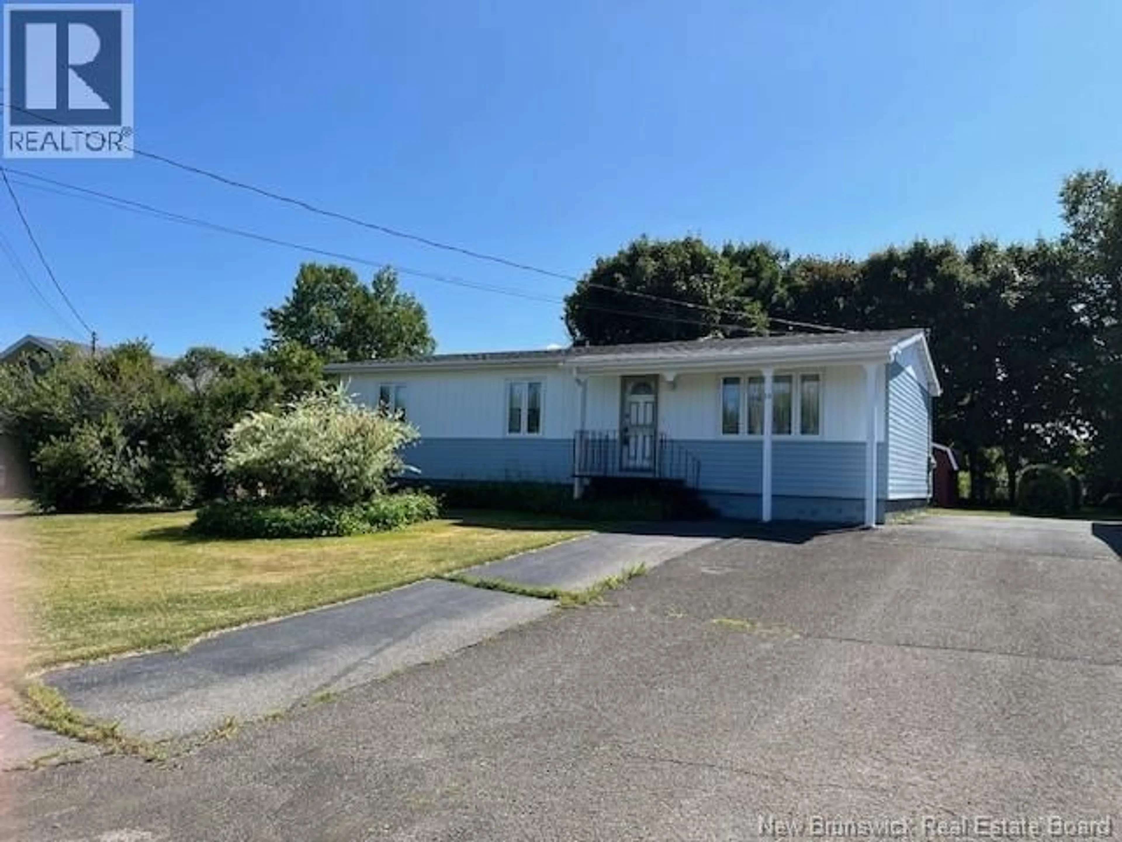 A pic from outside/outdoor area/front of a property/back of a property/a pic from drone, unknown for 14 KENNEDY STREET, Charlo New Brunswick E8E2M2