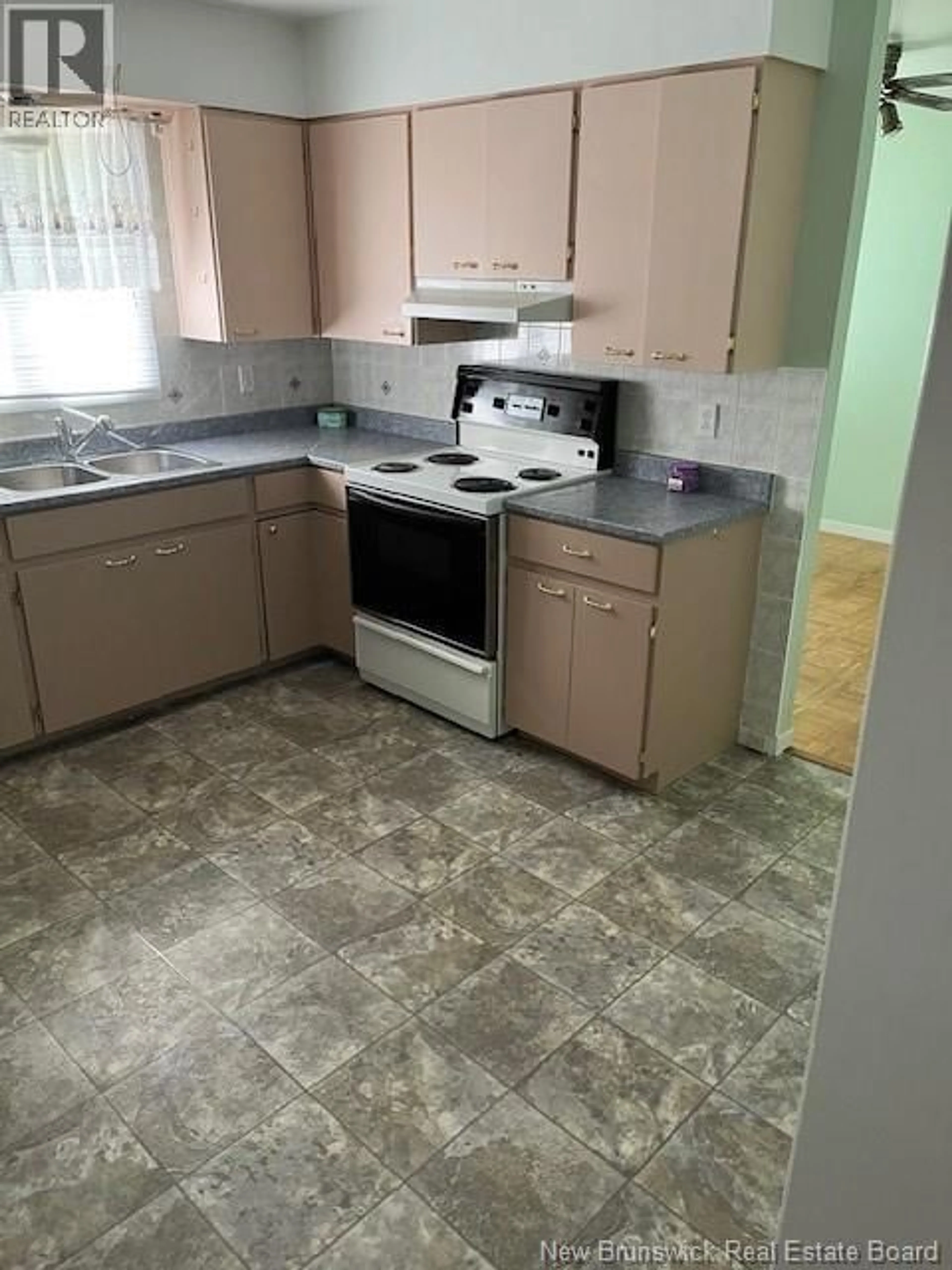 Standard kitchen, ceramic/tile floor for 14 KENNEDY STREET, Charlo New Brunswick E8E2M2