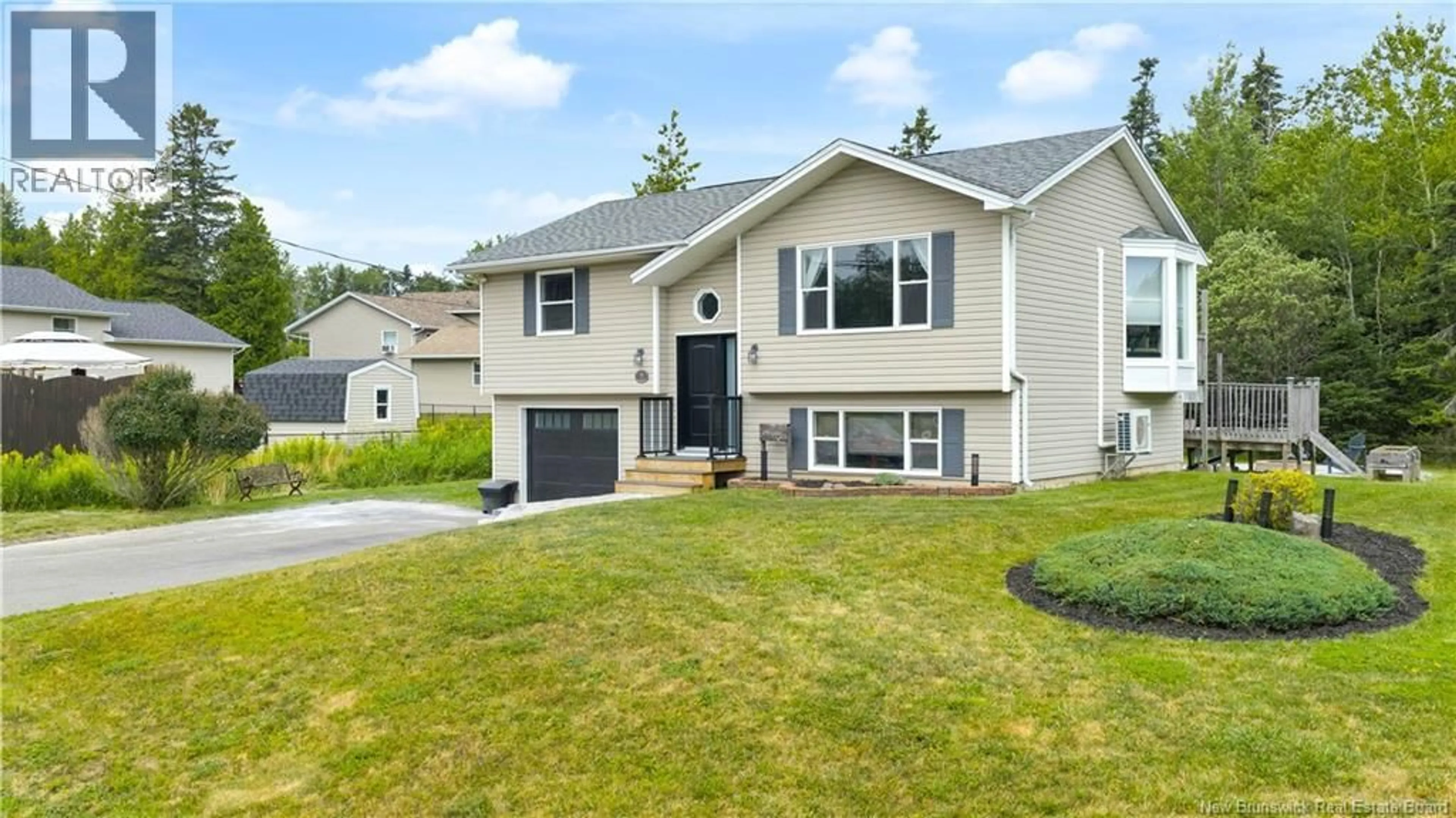 Home with vinyl exterior material, street for 7 GOLDRUSH DRIVE, Quispamsis New Brunswick E2E5Z7