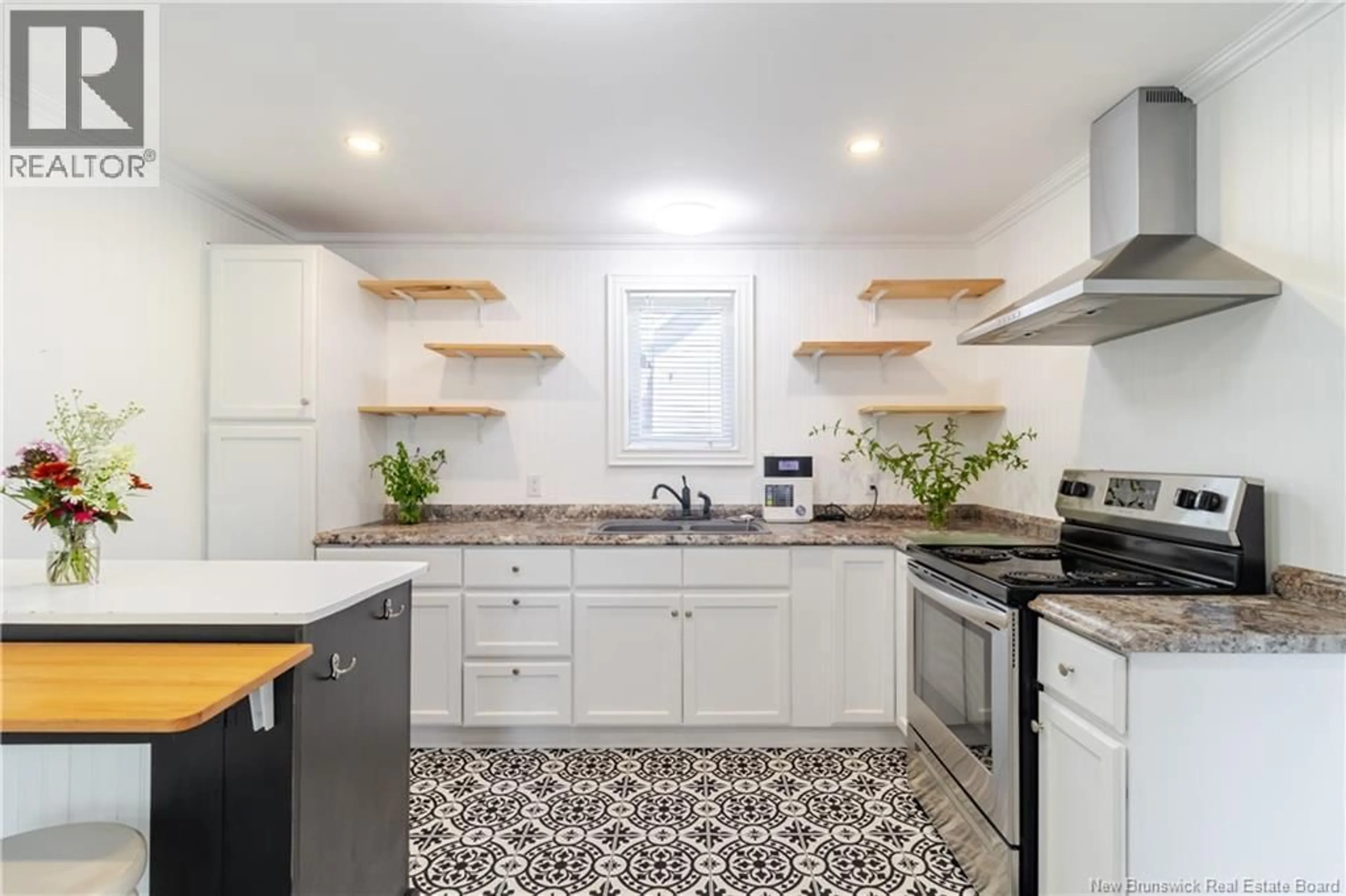 Open concept kitchen, ceramic/tile floor for 15 VANCEBORO ROAD, McAdam New Brunswick E6J1Z3