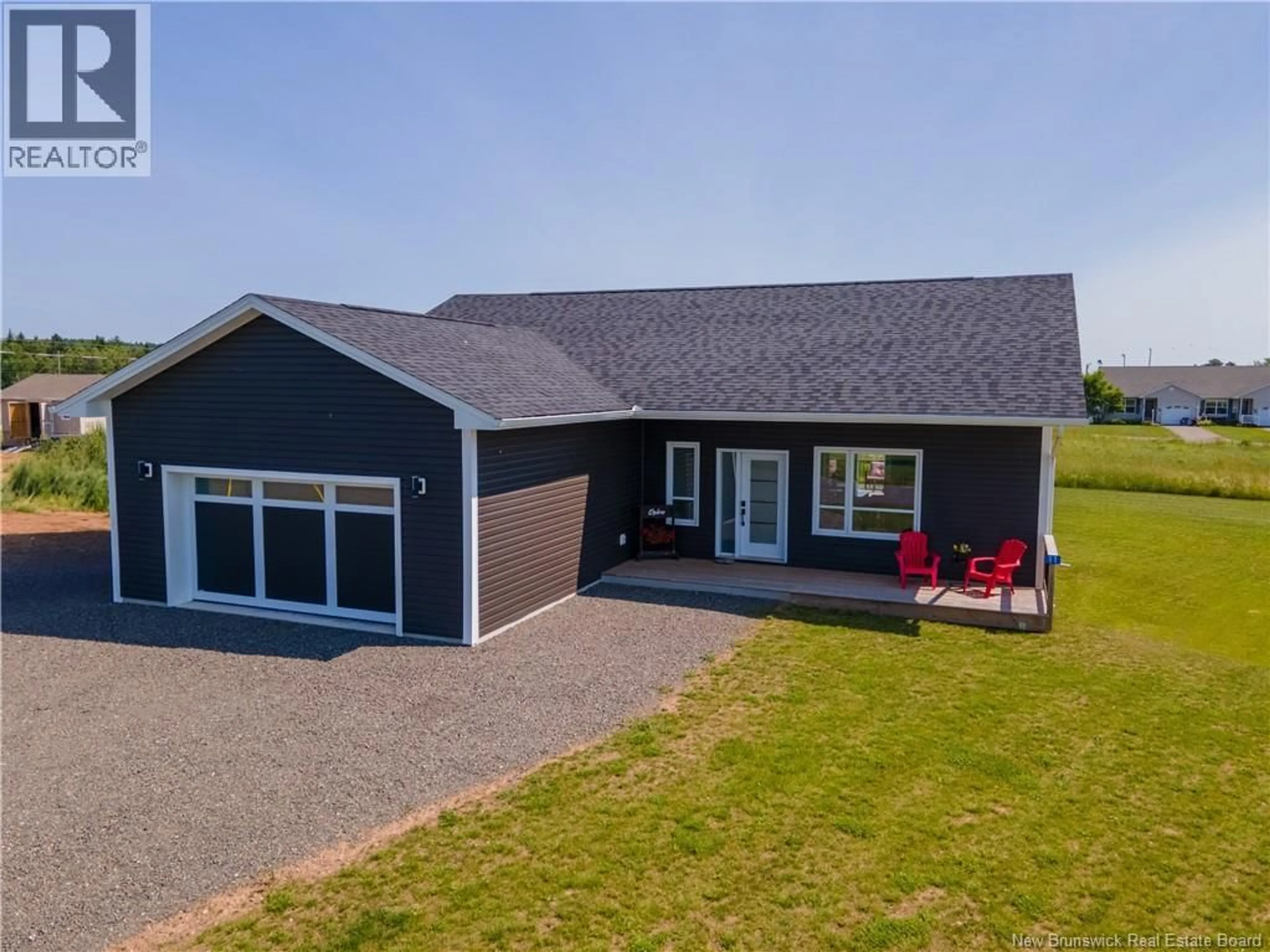 A pic from outside/outdoor area/front of a property/back of a property/a pic from drone, water/lake/river/ocean view for 11 RIVERSIDE DRIVE, Petitcodiac New Brunswick E4Z0K7