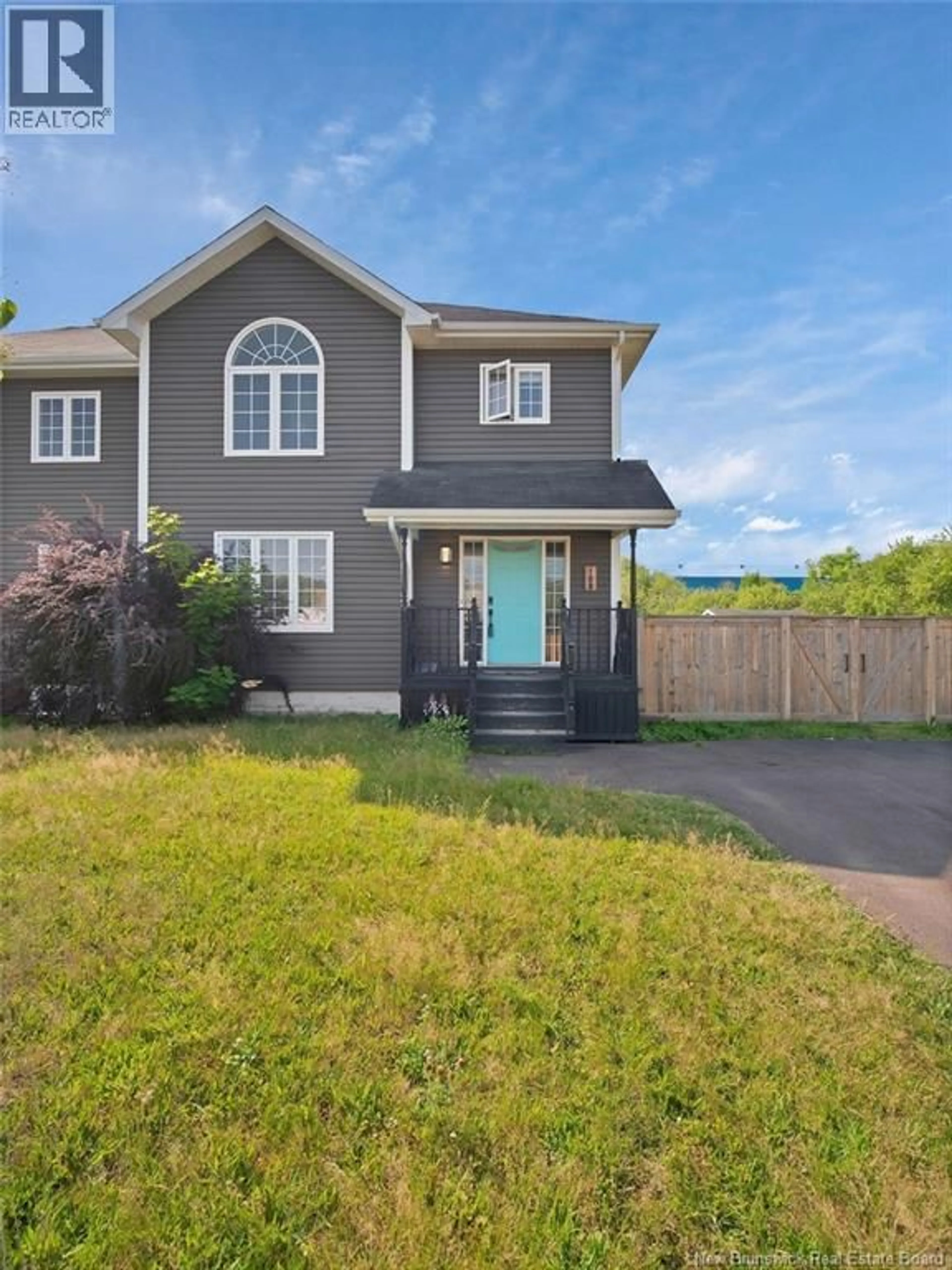 Home with vinyl exterior material, street for 108 HOULAHAN STREET, Dieppe New Brunswick E1A3J1