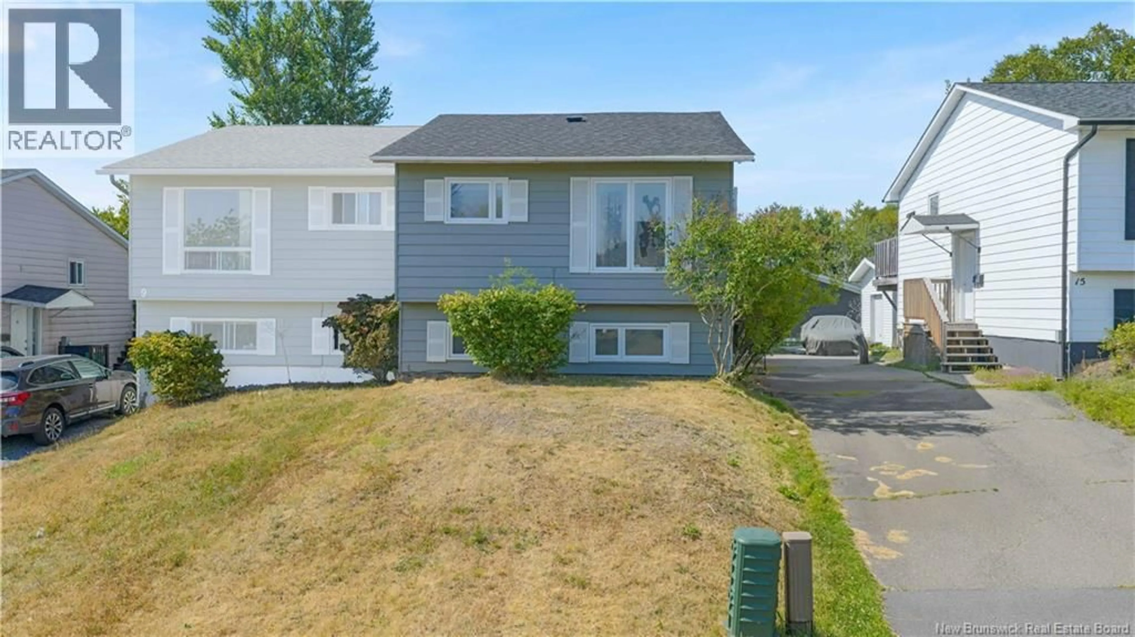 A pic from outside/outdoor area/front of a property/back of a property/a pic from drone, street for 11 CLOVELLY, Saint John New Brunswick E2K4L6