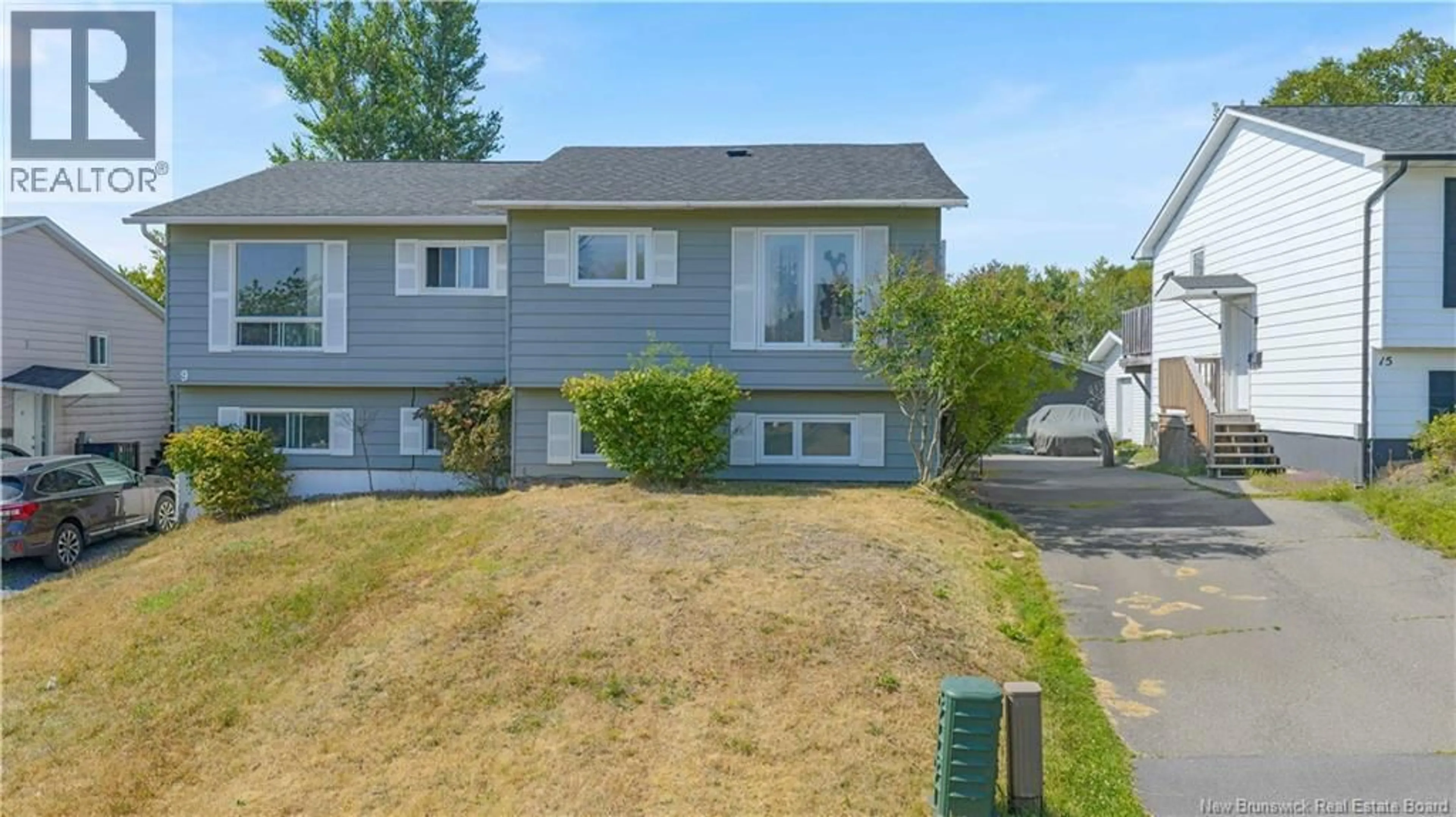 A pic from outside/outdoor area/front of a property/back of a property/a pic from drone, street for 11 CLOVELLY, Saint John New Brunswick E2K4L6