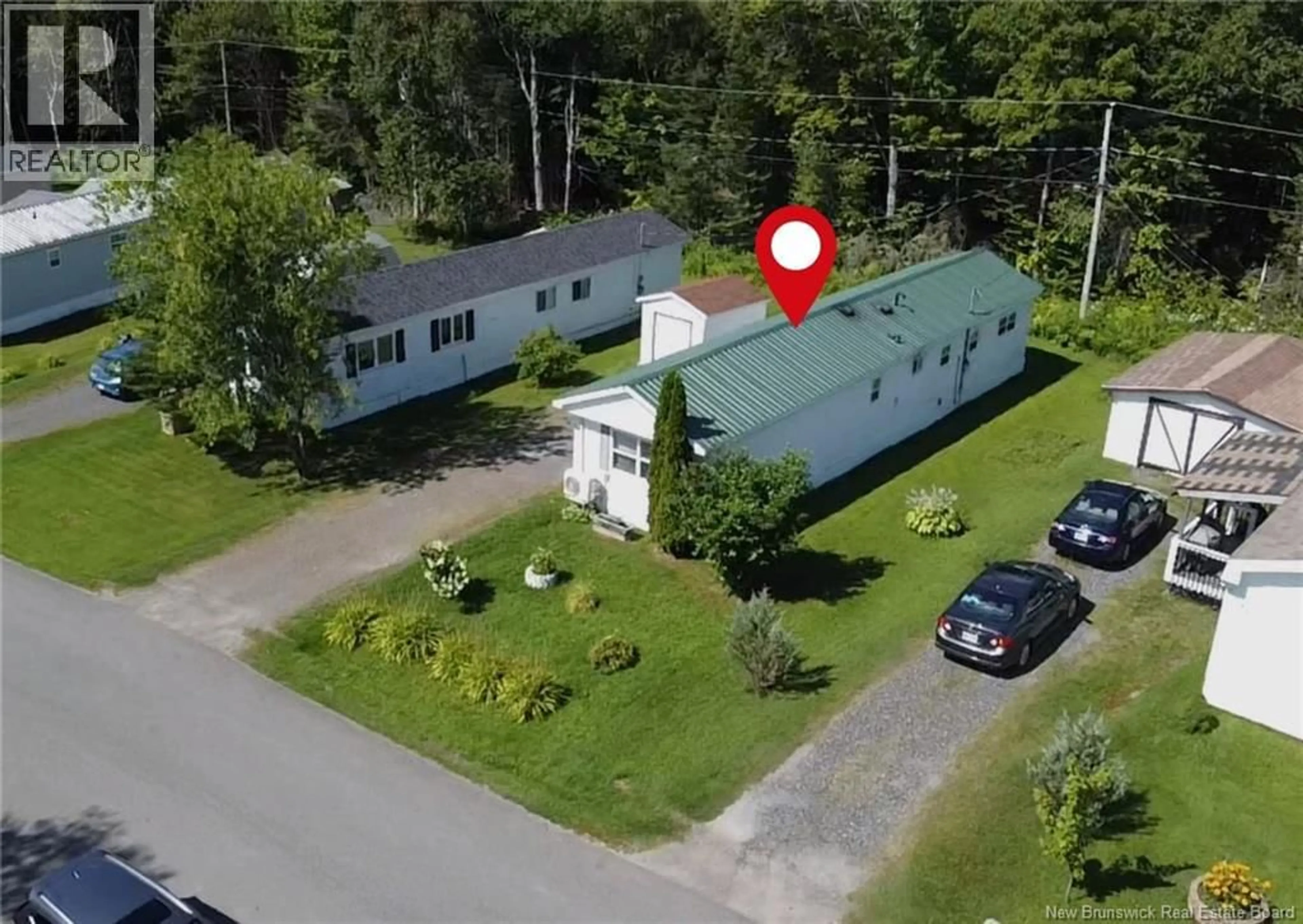 A pic from outside/outdoor area/front of a property/back of a property/a pic from drone, street for 121 EASTWOOD STREET, Fredericton New Brunswick E3B6P7