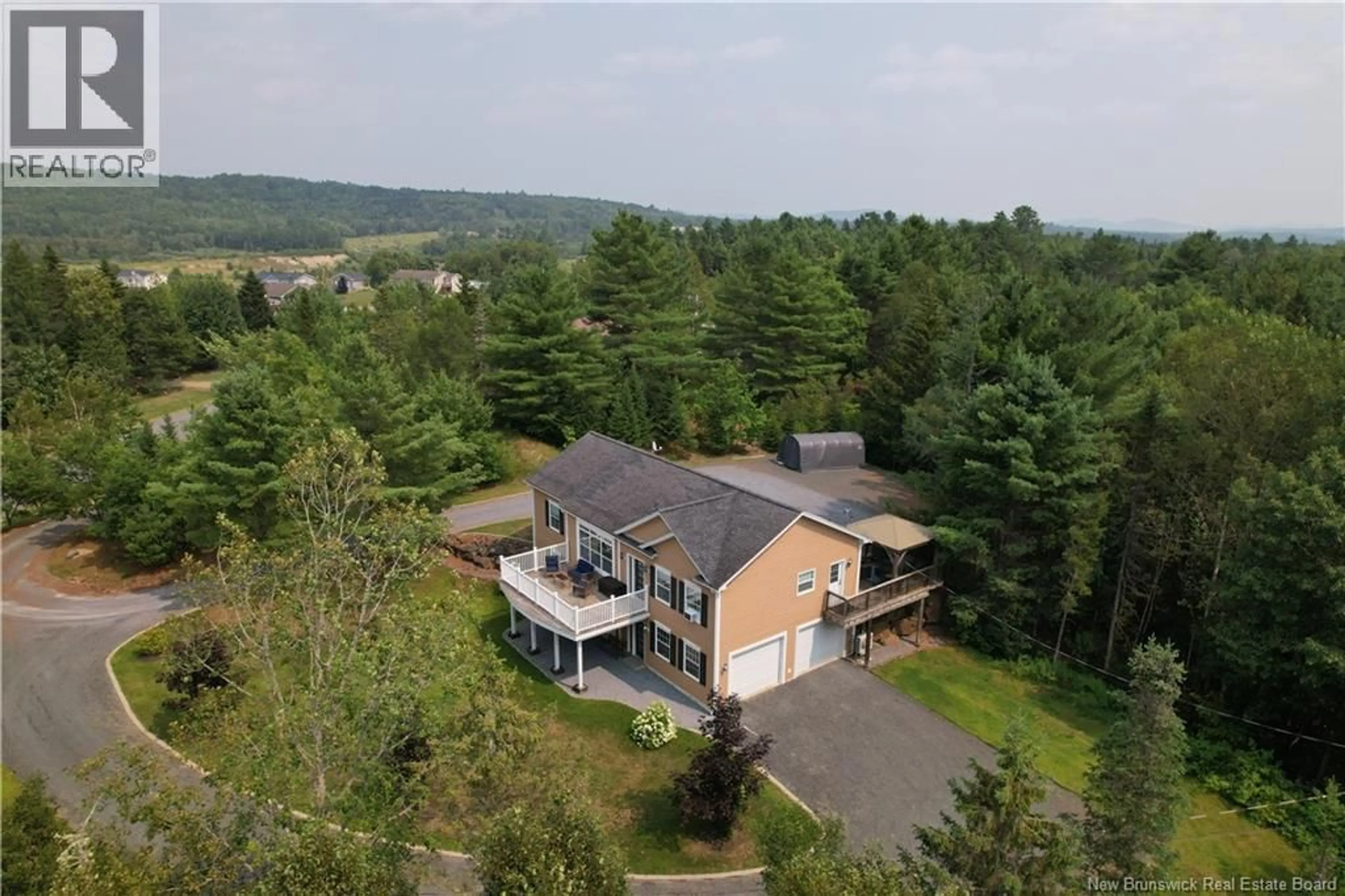 A pic from outside/outdoor area/front of a property/back of a property/a pic from drone, mountain view for 6 MORIN AVENUE, Valley Road New Brunswick E3L0E1