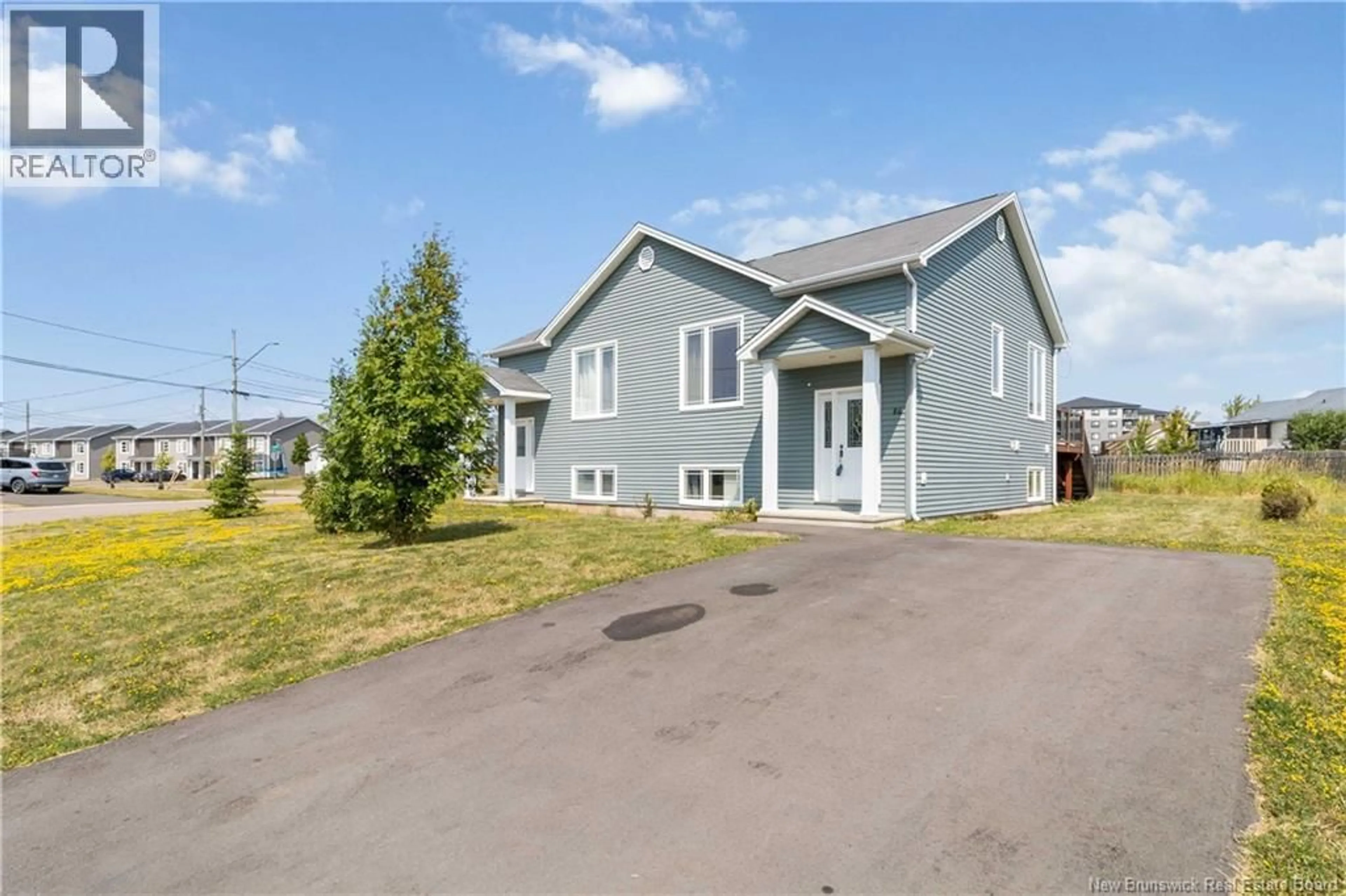 Home with vinyl exterior material, street for 86 JEANNETTE STREET, Dieppe New Brunswick E1A0K4