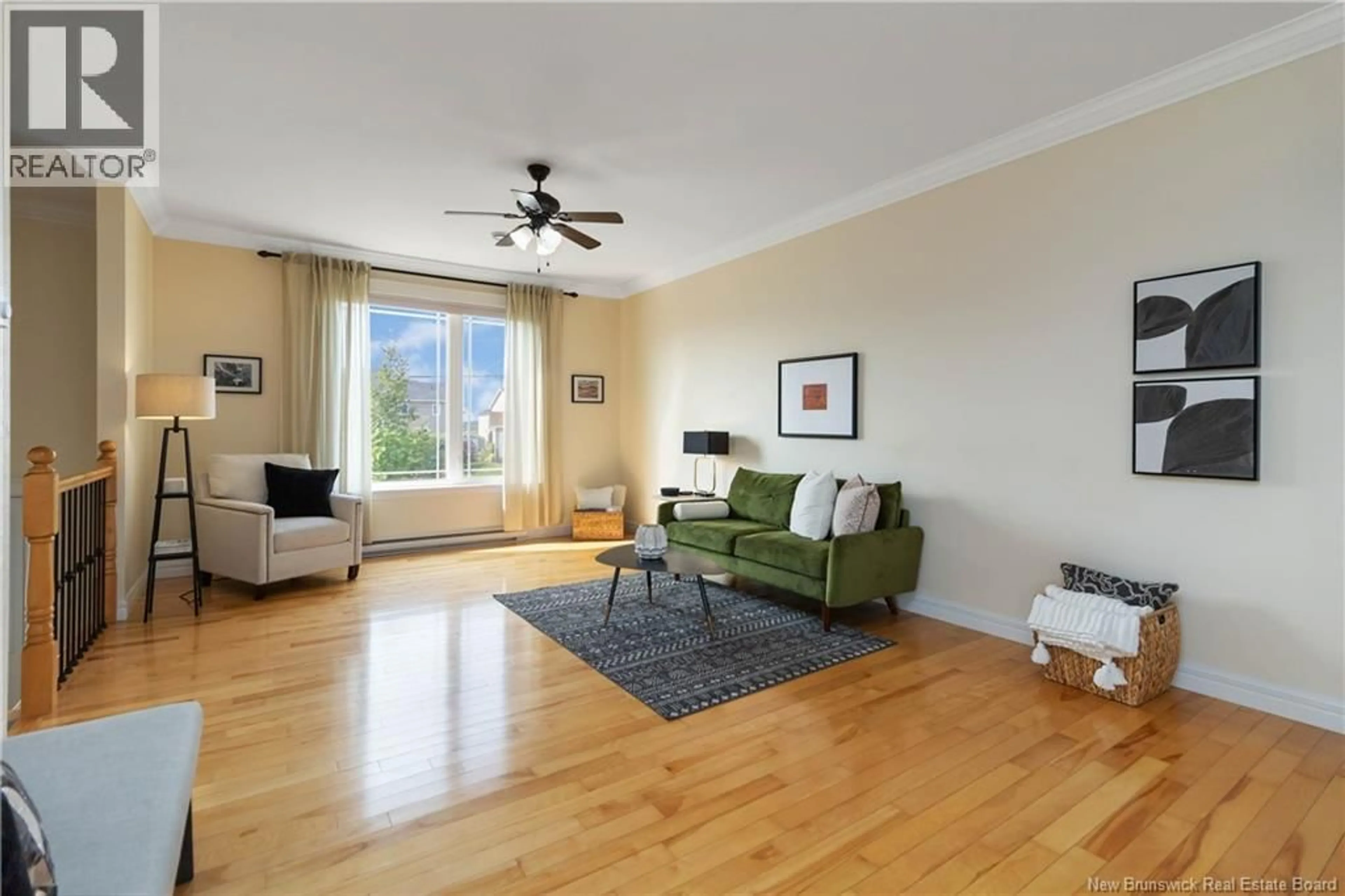 Living room with furniture, wood/laminate floor for 86 JEANNETTE STREET, Dieppe New Brunswick E1A0K4