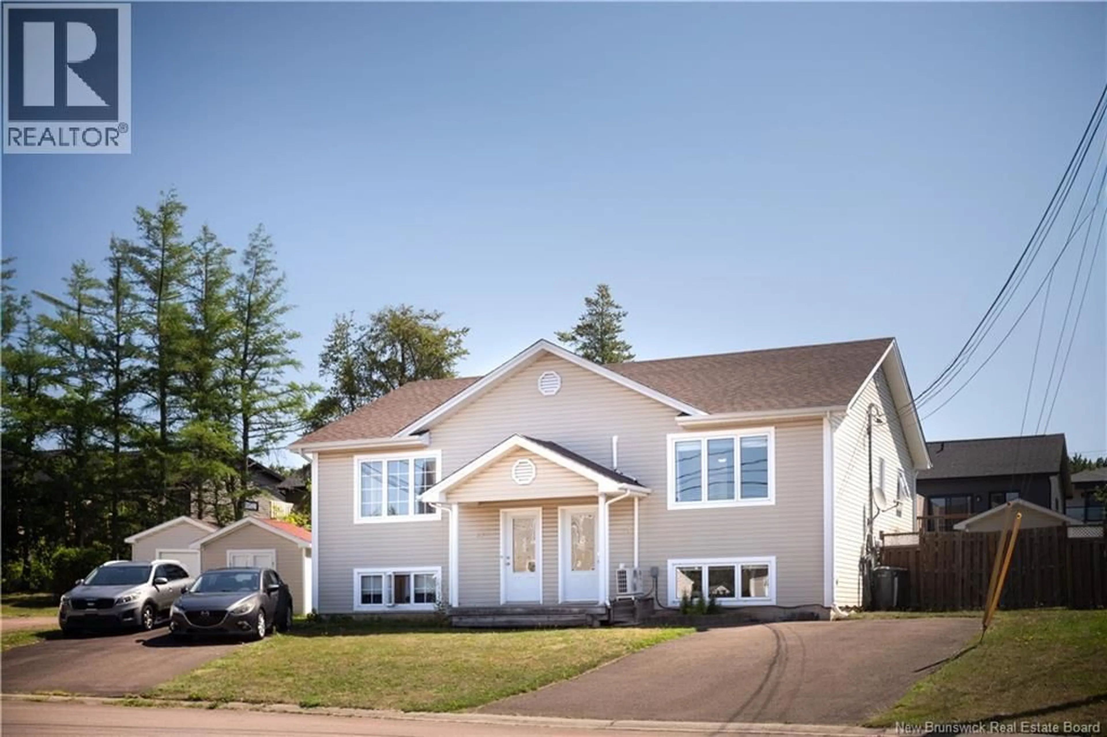 Home with vinyl exterior material, street for 25 DANUBE COURT, Dieppe New Brunswick E1A8G6