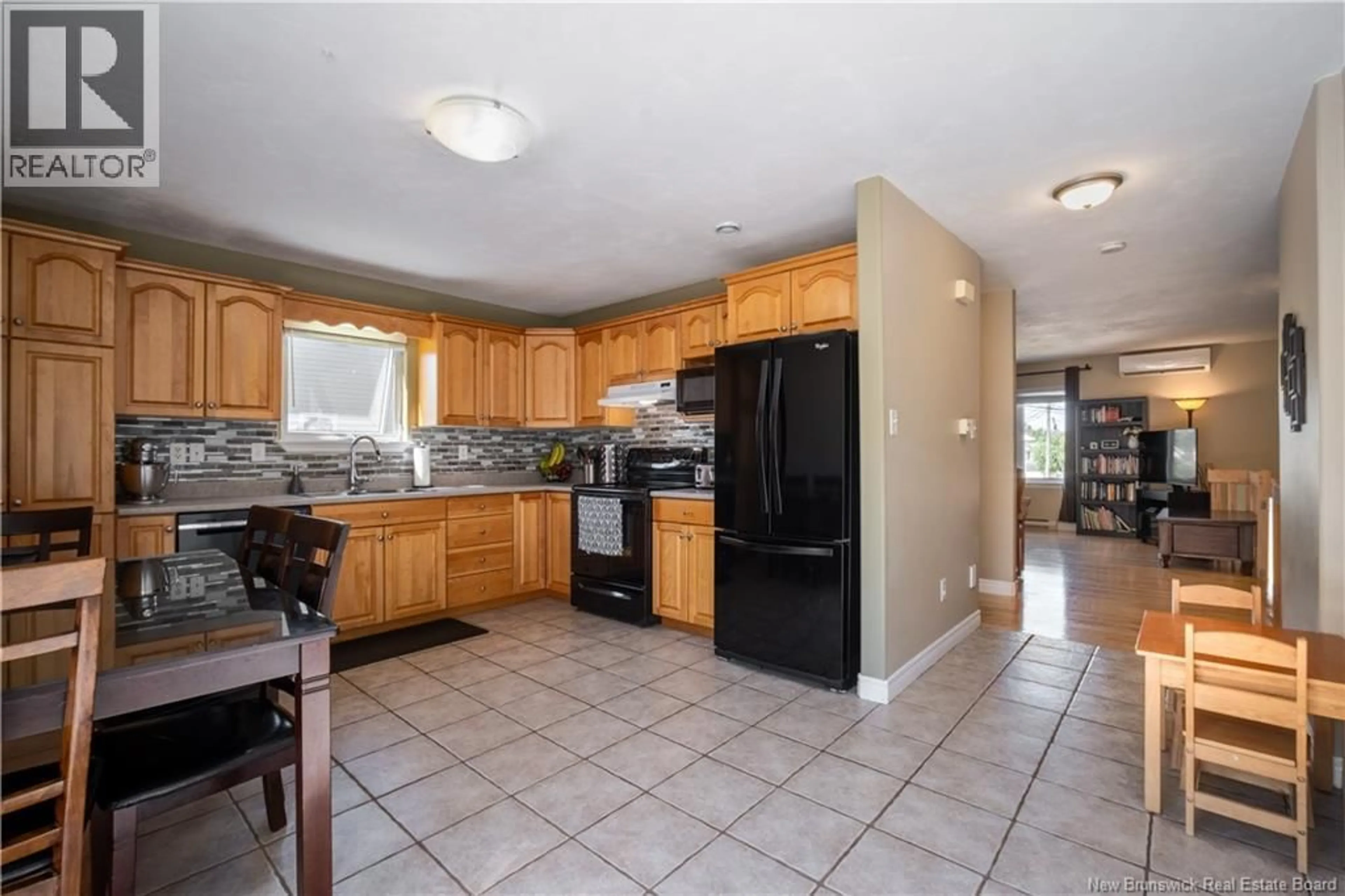 Open concept kitchen, ceramic/tile floor for 25 DANUBE COURT, Dieppe New Brunswick E1A8G6