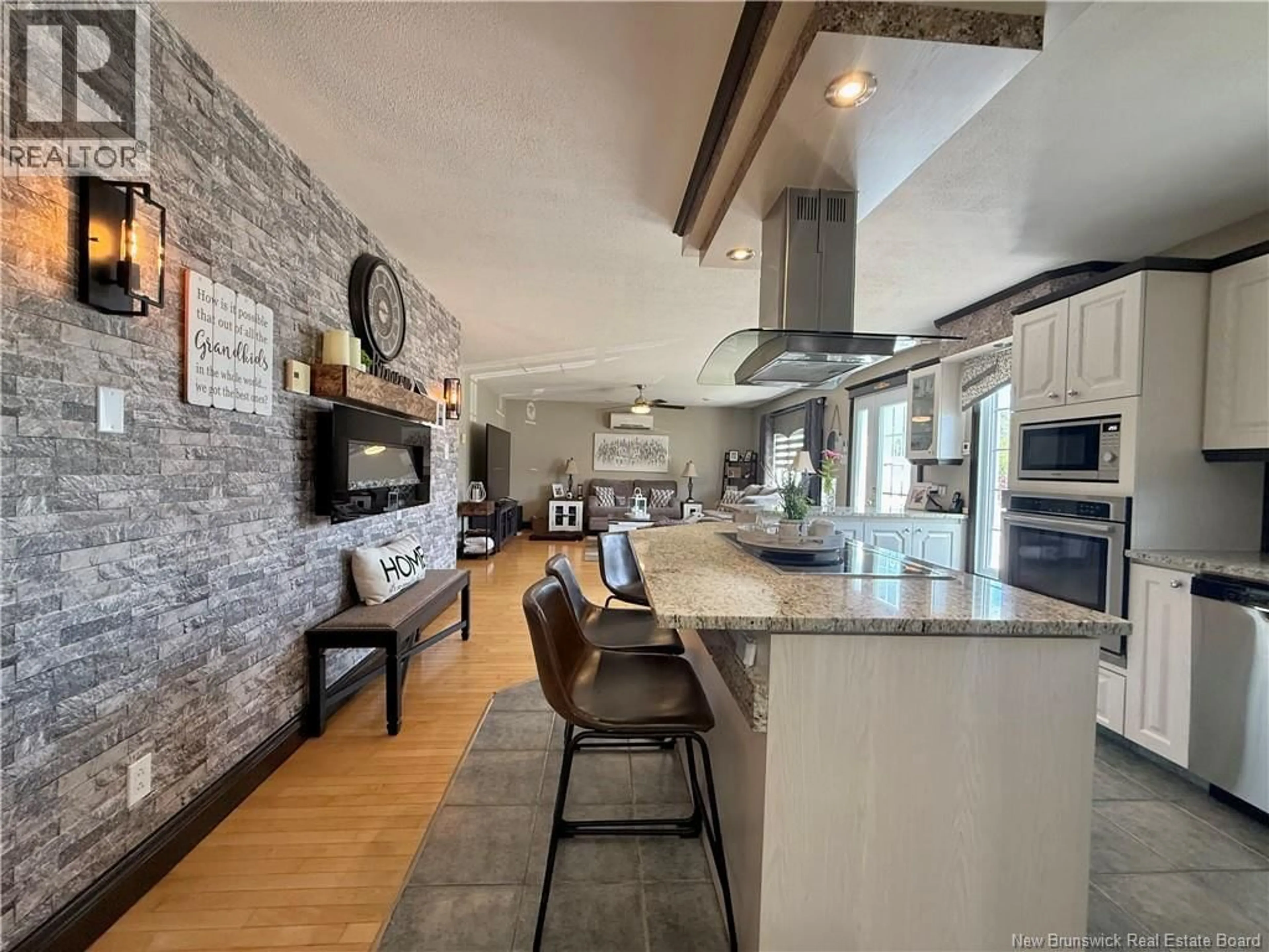 Open concept kitchen, ceramic/tile floor for 30 LÉOPOLD-COUTURIER AVENUE, Saint-Jacques New Brunswick E7B1E2
