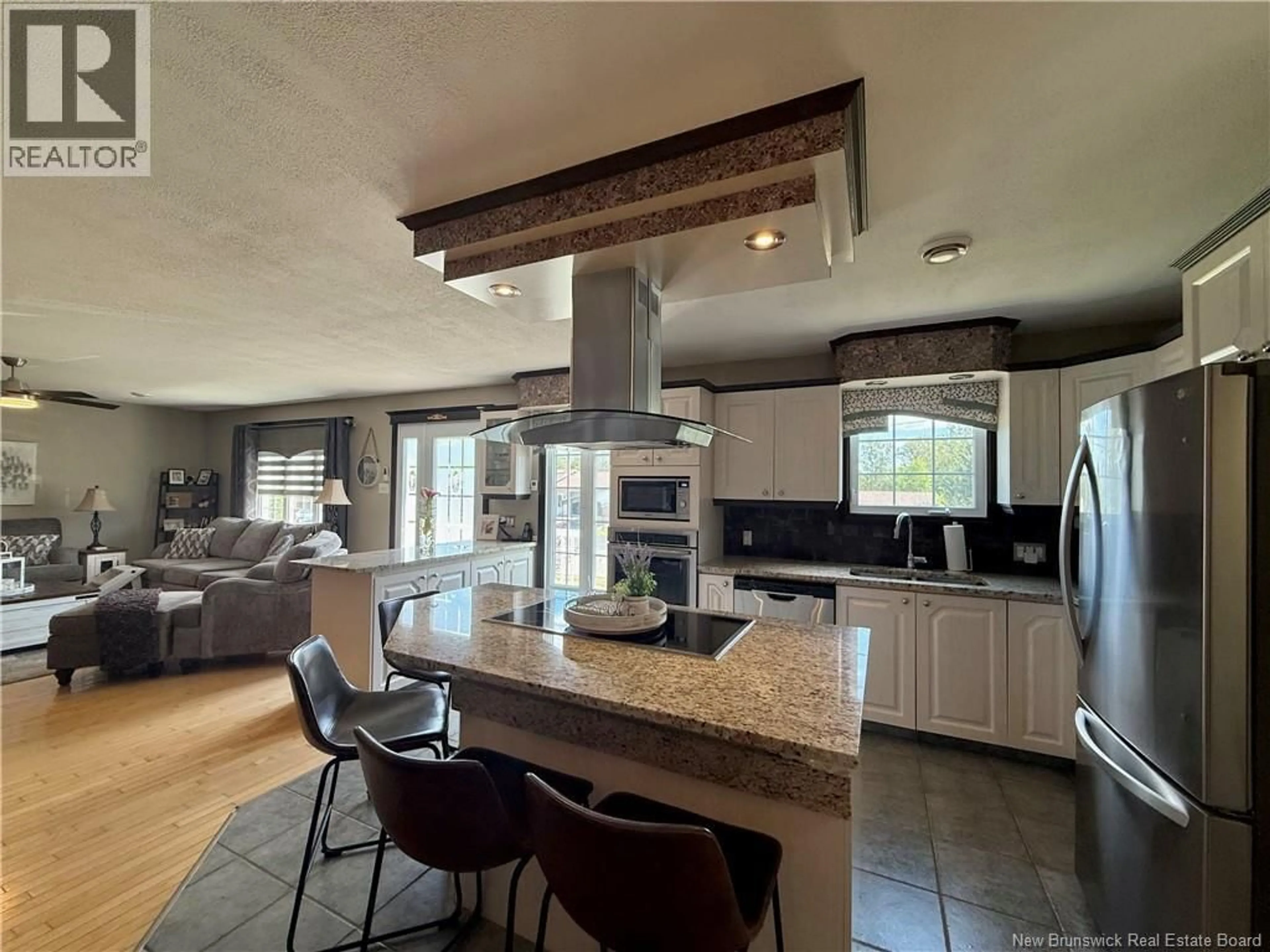 Open concept kitchen, ceramic/tile floor for 30 LÉOPOLD-COUTURIER AVENUE, Saint-Jacques New Brunswick E7B1E2