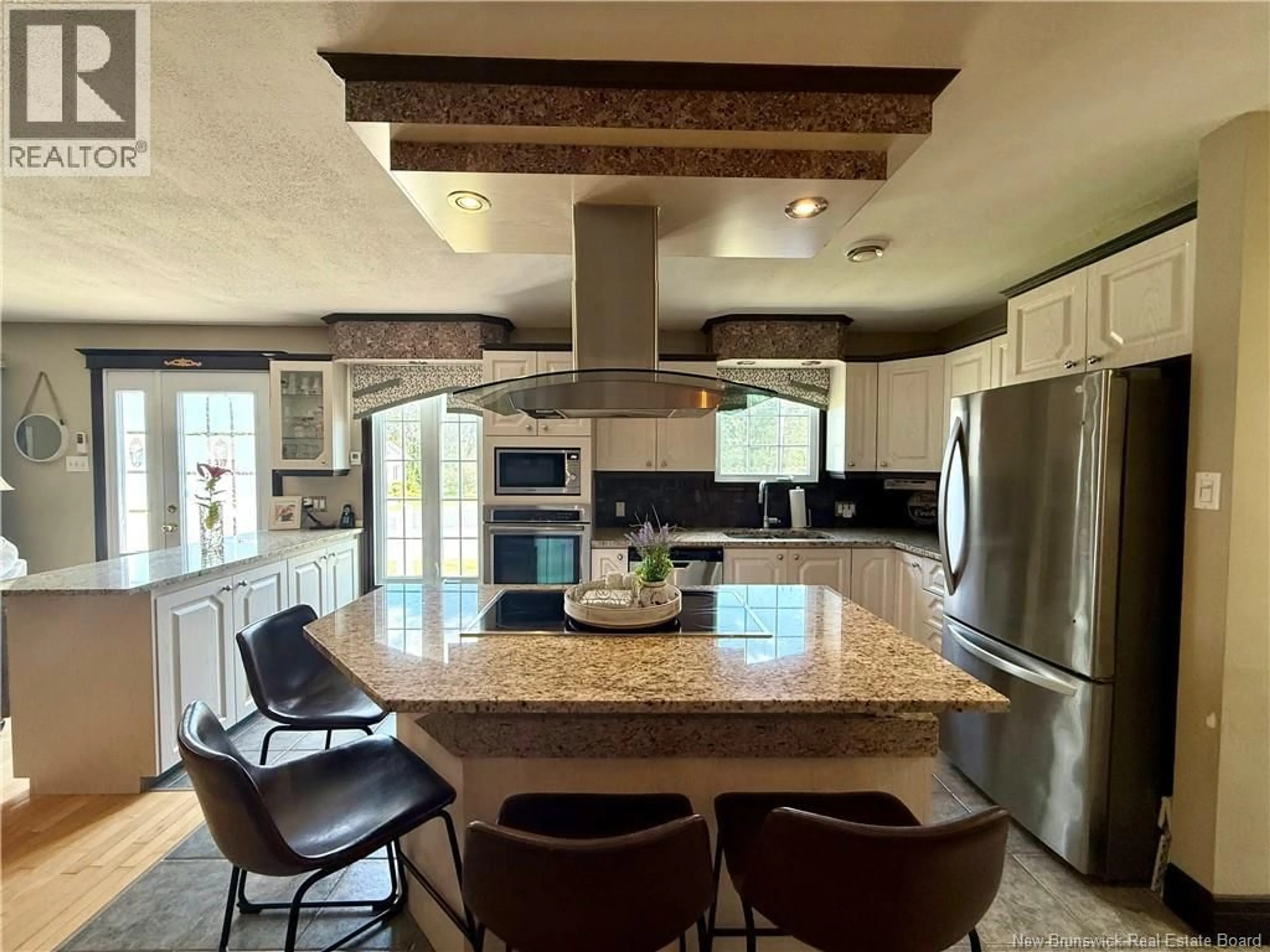 Open concept kitchen, ceramic/tile floor for 30 LÉOPOLD-COUTURIER AVENUE, Saint-Jacques New Brunswick E7B1E2