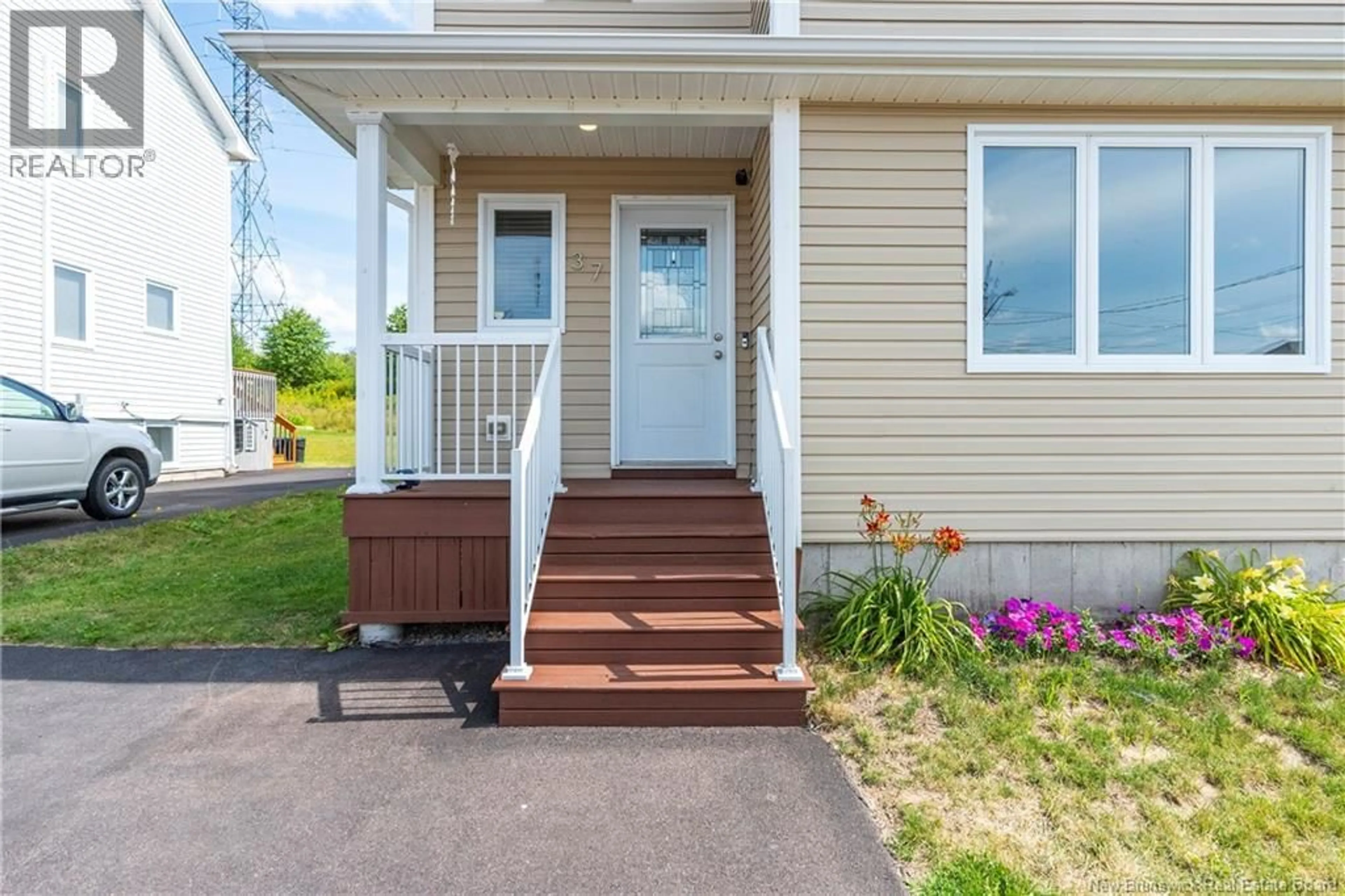 Home with vinyl exterior material, street for 37 STILLWATER DRIVE, Moncton New Brunswick E1E0E3