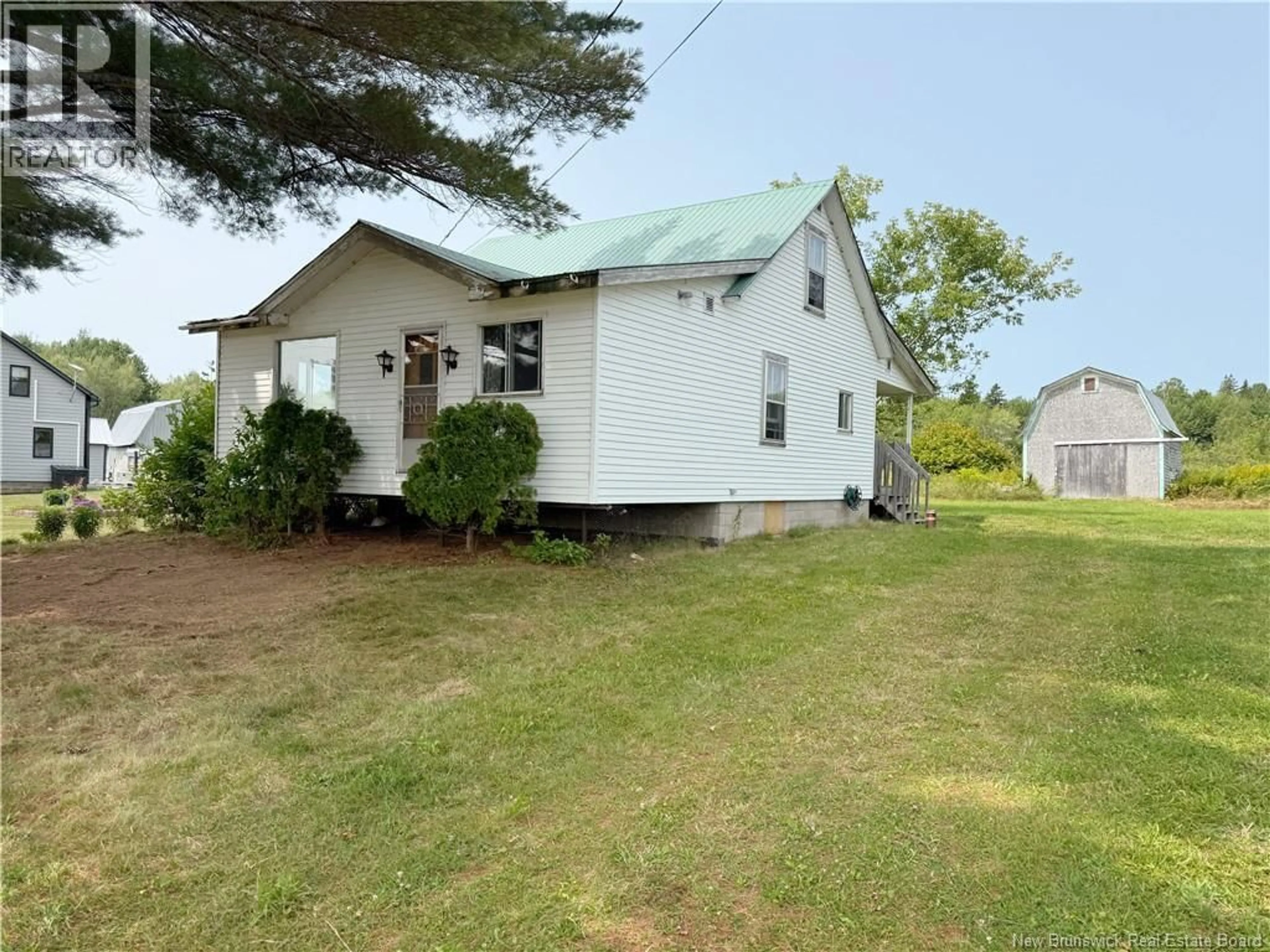 A pic from outside/outdoor area/front of a property/back of a property/a pic from drone, unknown for 76 ROUTE 715, Coles Island New Brunswick E4C2T1
