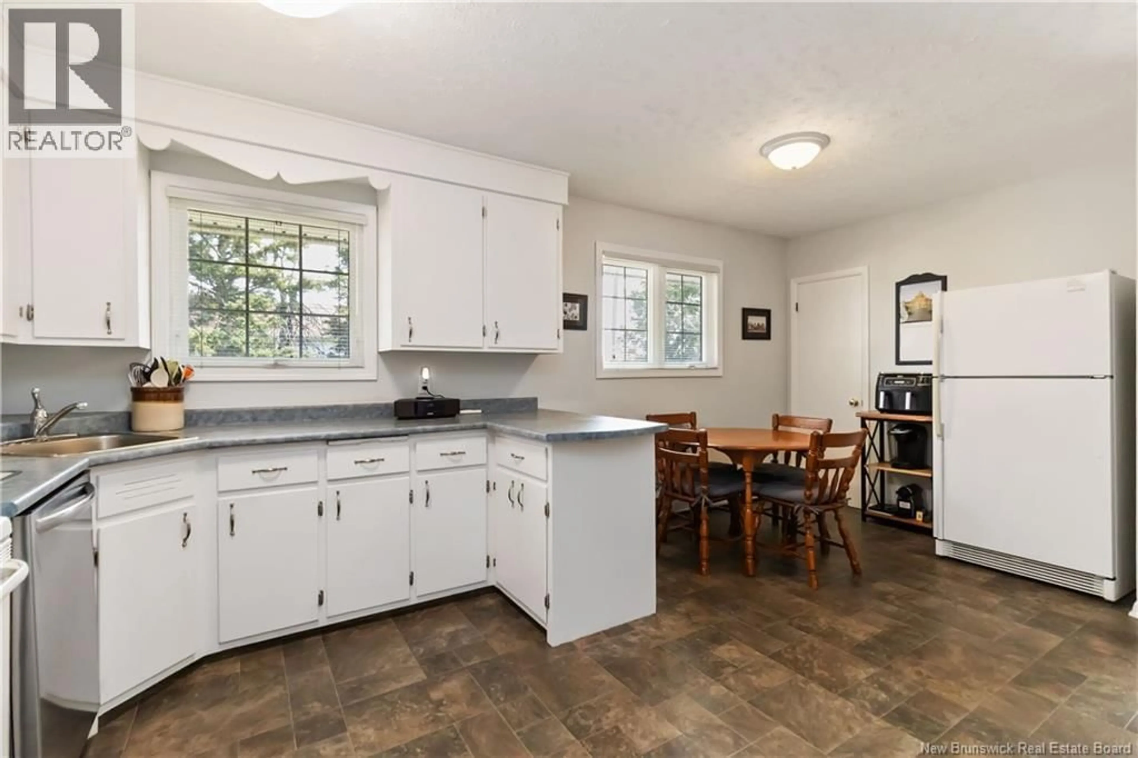 Open concept kitchen, ceramic/tile floor for 39 LEESIDE DRIVE, Moncton New Brunswick E1C4L4
