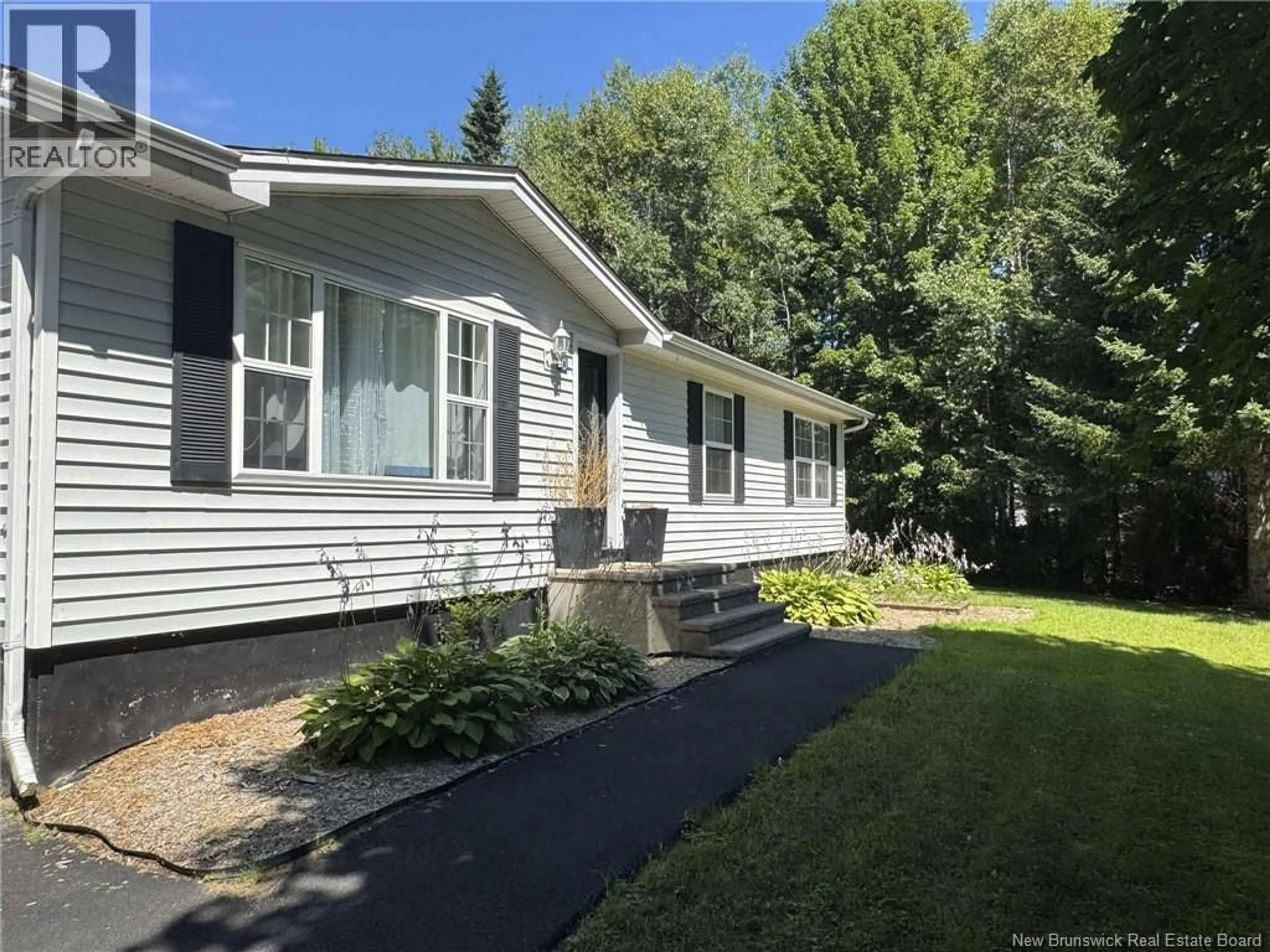 Home with vinyl exterior material, street for 10 ESTABROOKS AVENUE, Lincoln New Brunswick E3B8S8