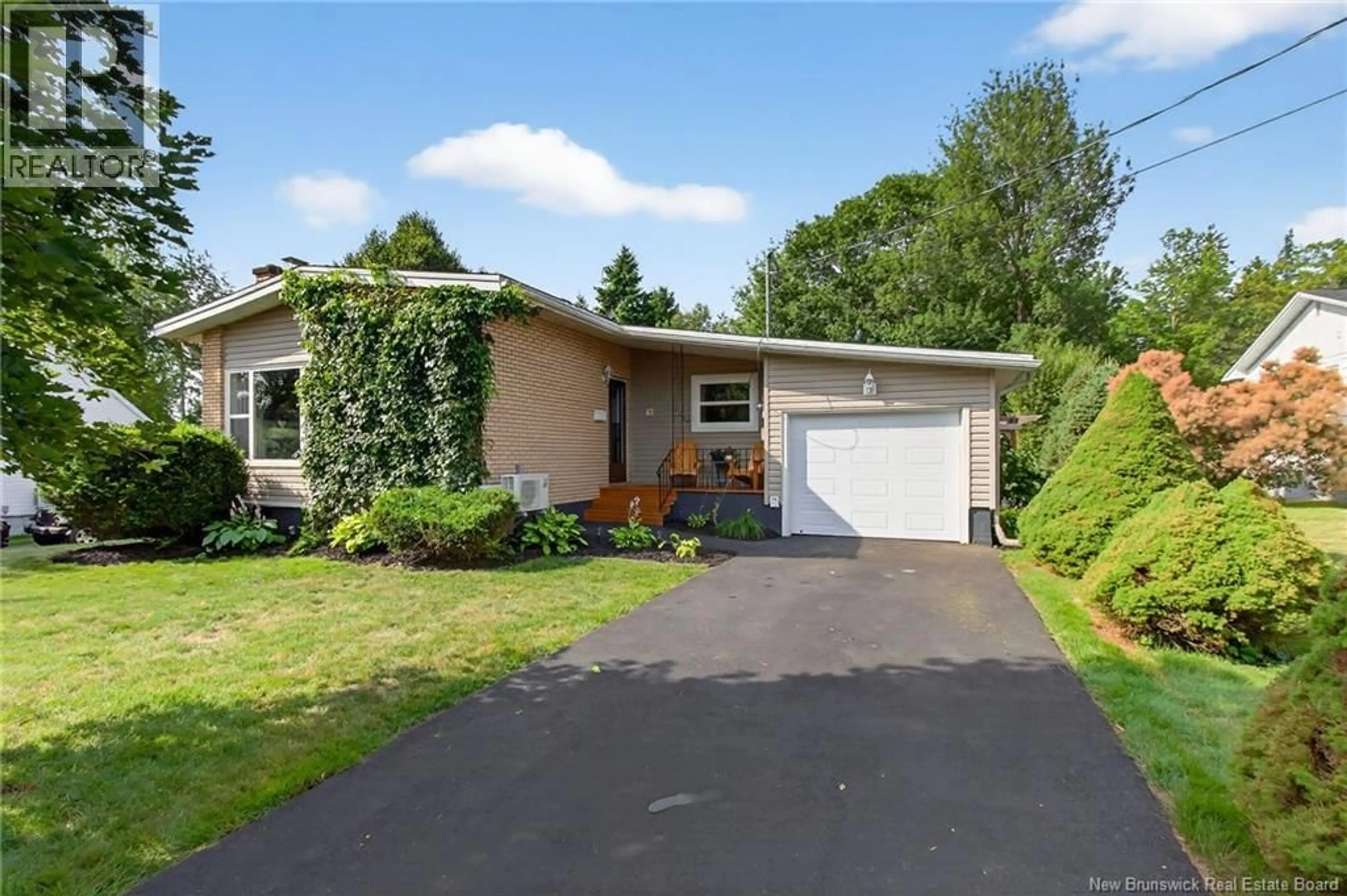 Home with vinyl exterior material, street for 62 WOODLAWN, Moncton New Brunswick E1E2J9