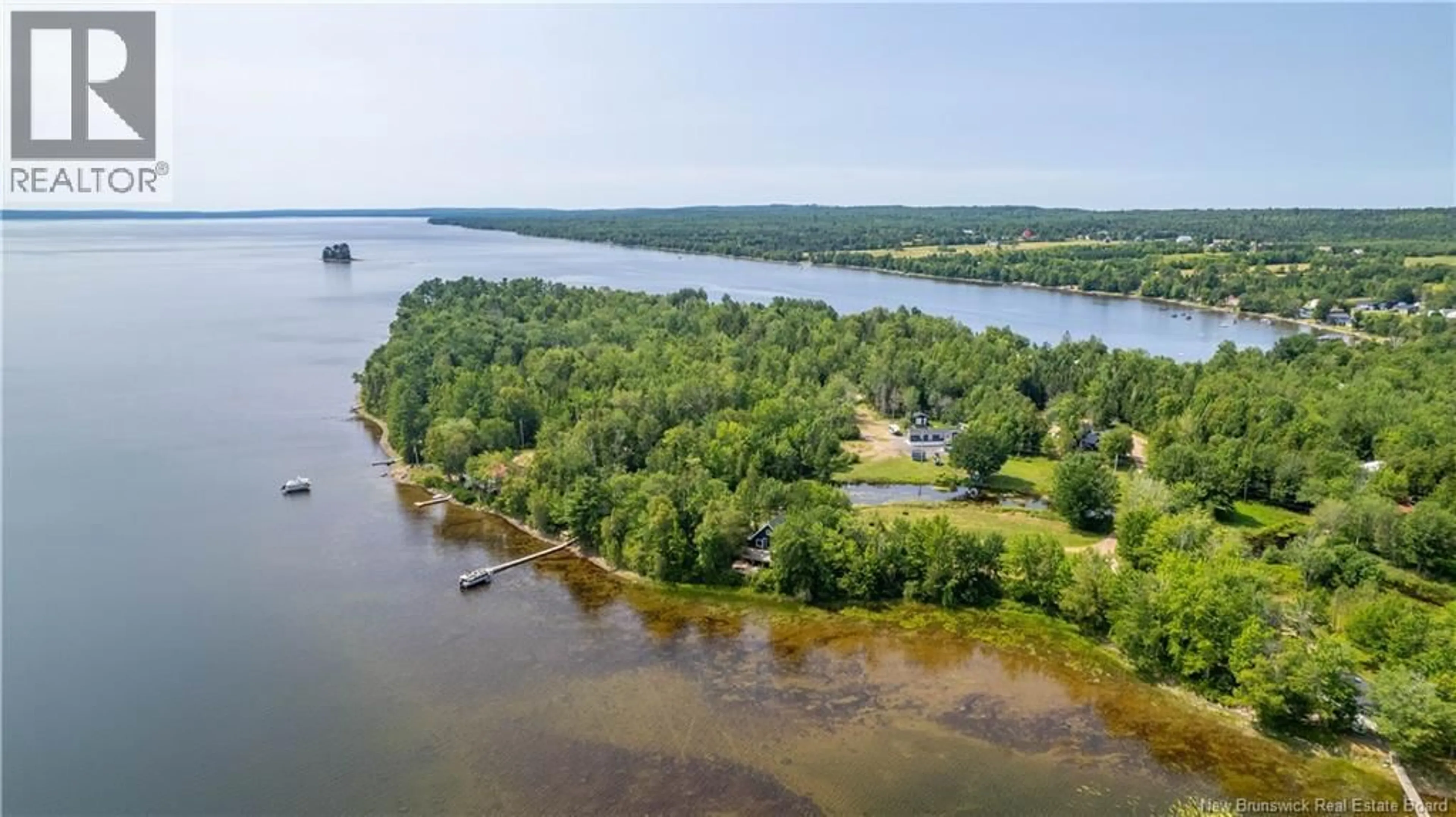 A pic from outside/outdoor area/front of a property/back of a property/a pic from drone, water/lake/river/ocean view for 27 BINK CRESCENT, Harvey New Brunswick E6K1J3