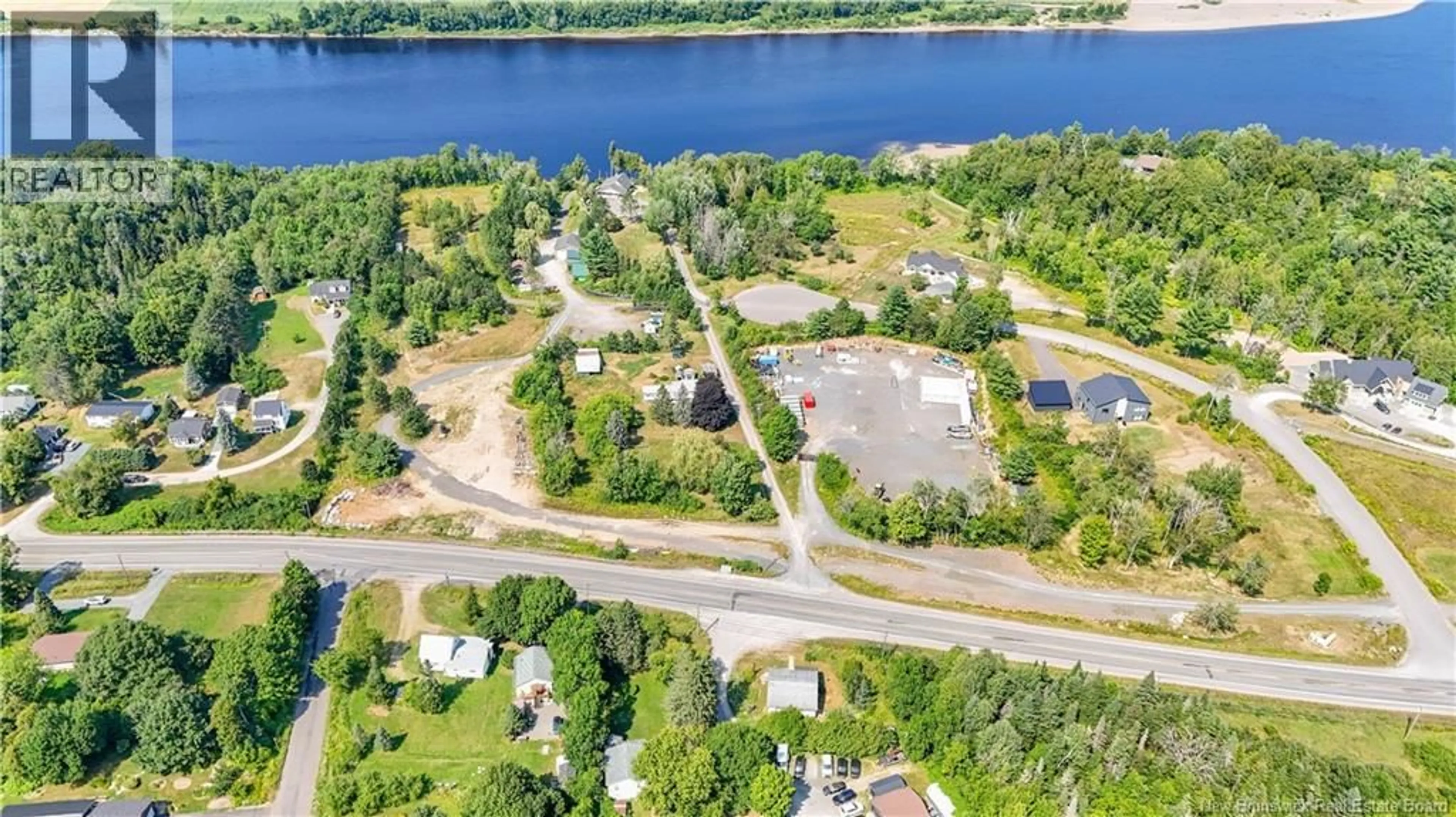 A pic from outside/outdoor area/front of a property/back of a property/a pic from drone, water/lake/river/ocean view for 3638 ROUTE 102 HWY, Island View New Brunswick E3E1E4