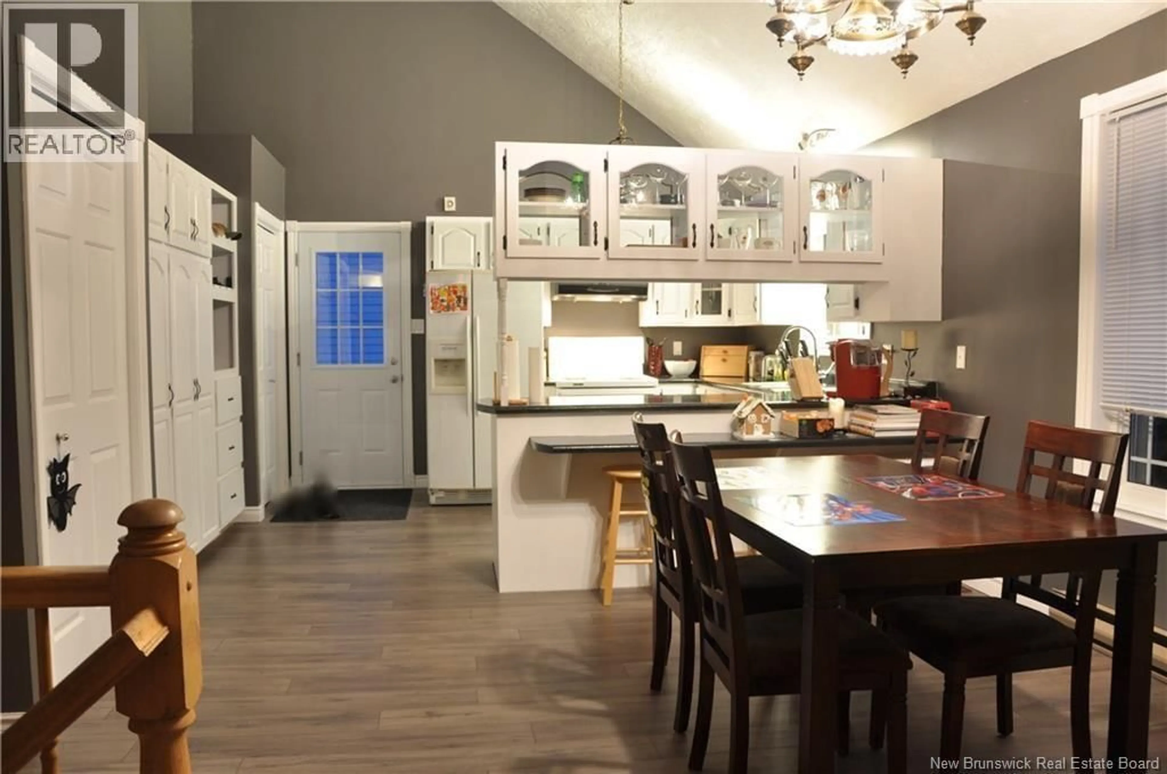 Open concept kitchen, wood/laminate floor for 35 FULTON CRESCENT, Moncton New Brunswick E1C9J1