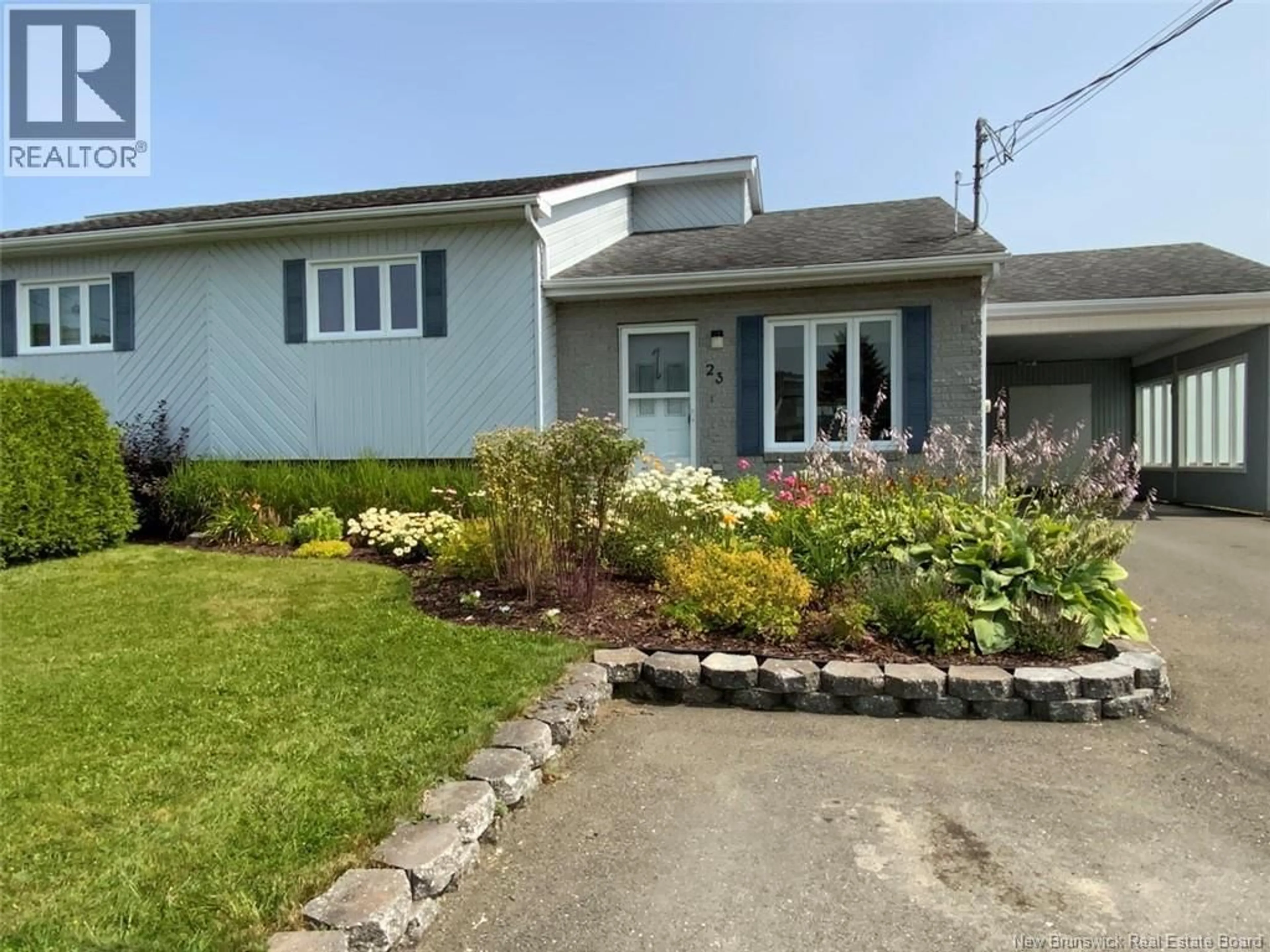 A pic from outside/outdoor area/front of a property/back of a property/a pic from drone, street for 23 GAUDREAU AVENUE, Edmundston New Brunswick E3V4B9