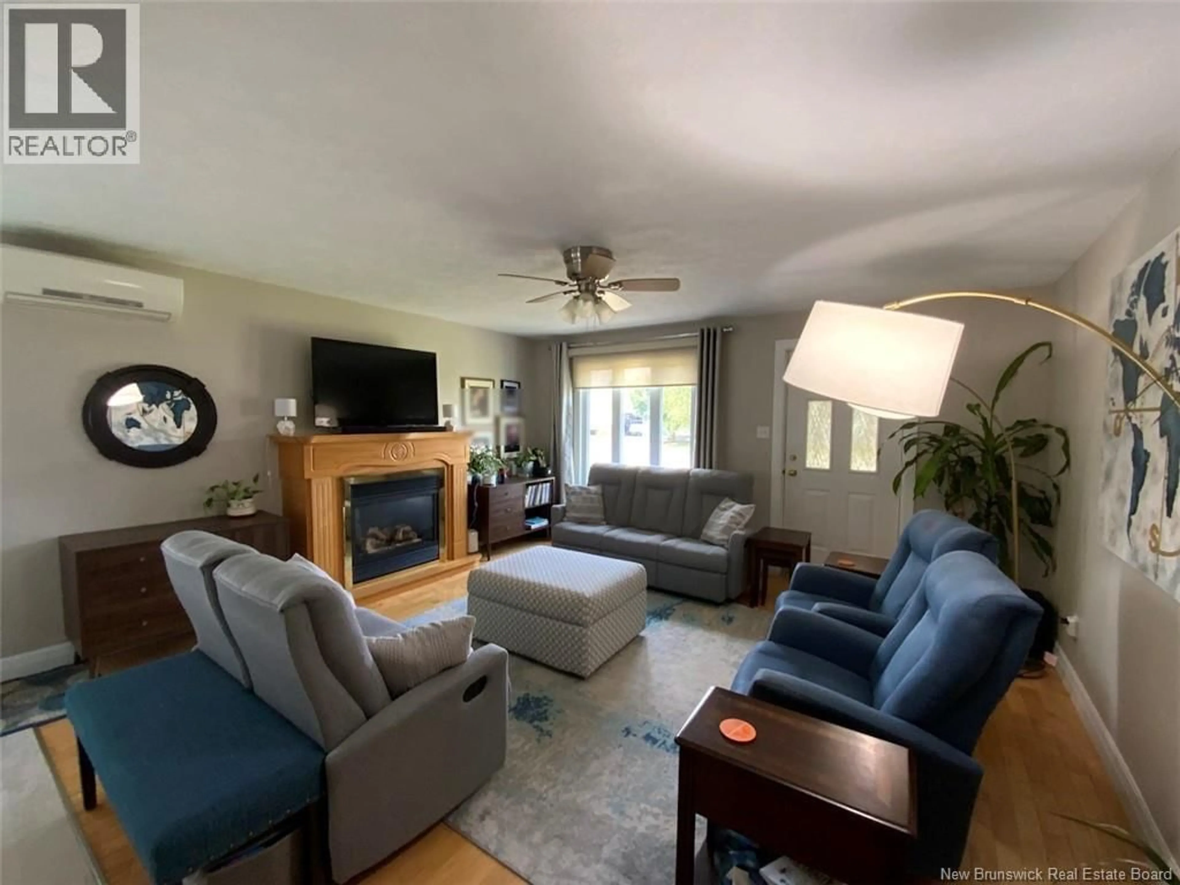 Living room with furniture, unknown for 23 GAUDREAU AVENUE, Edmundston New Brunswick E3V4B9