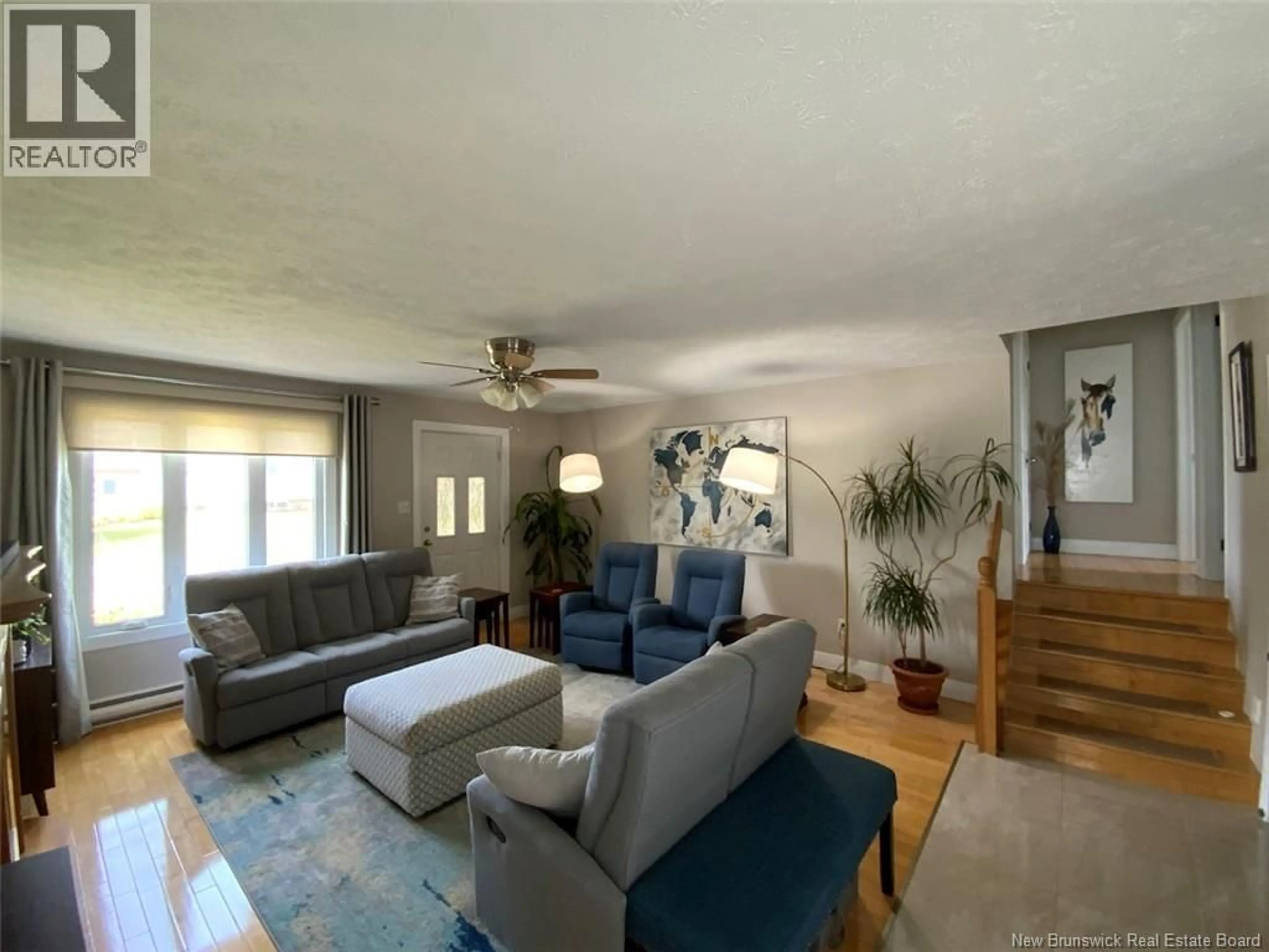 Living room with furniture, unknown for 23 GAUDREAU AVENUE, Edmundston New Brunswick E3V4B9