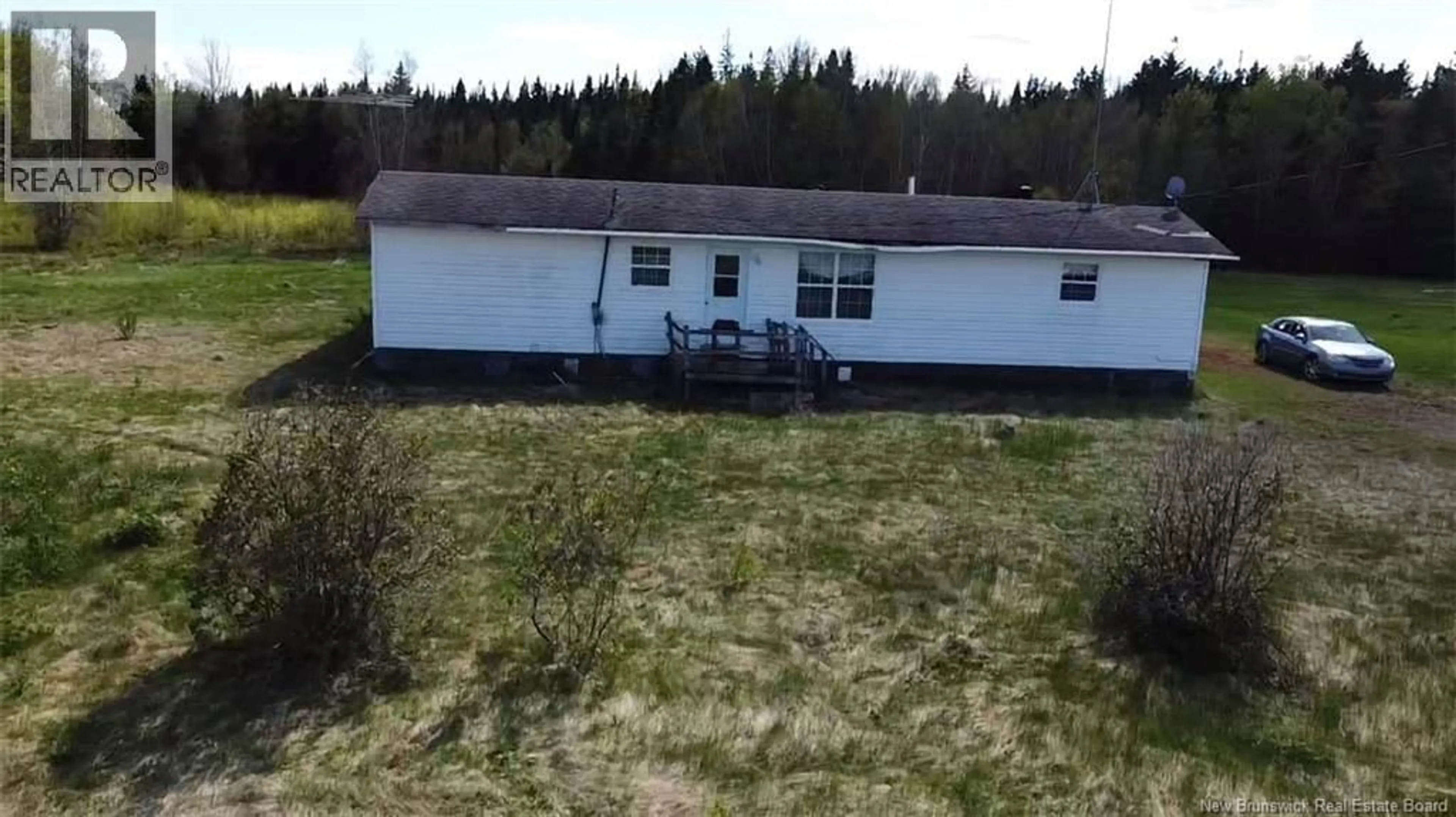 A pic from outside/outdoor area/front of a property/back of a property/a pic from drone, building for 6762 ROUTE 10, Upper Salmon Creek New Brunswick E4A1J1