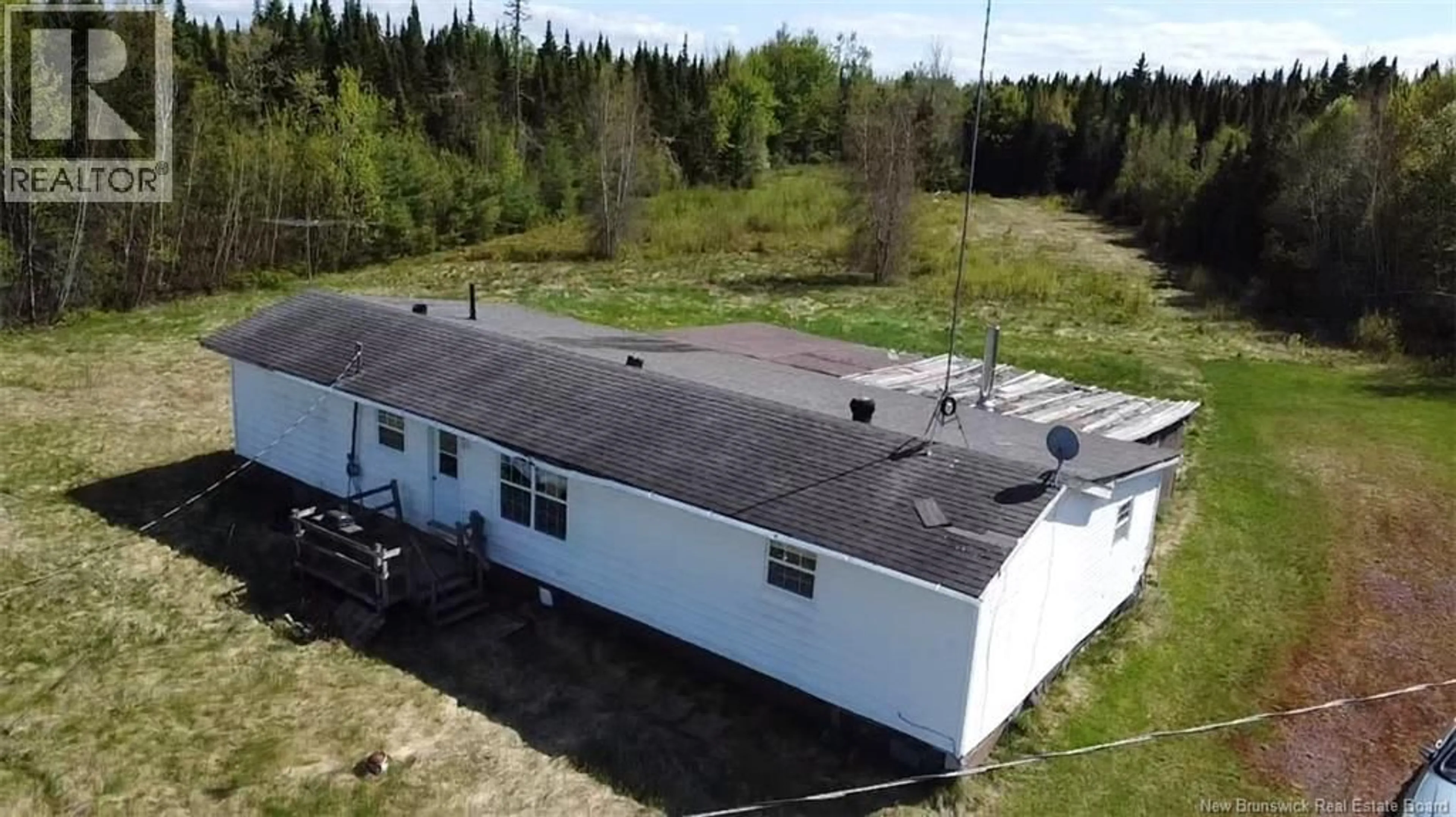 A pic from outside/outdoor area/front of a property/back of a property/a pic from drone, building for 6762 ROUTE 10, Upper Salmon Creek New Brunswick E4A1J1