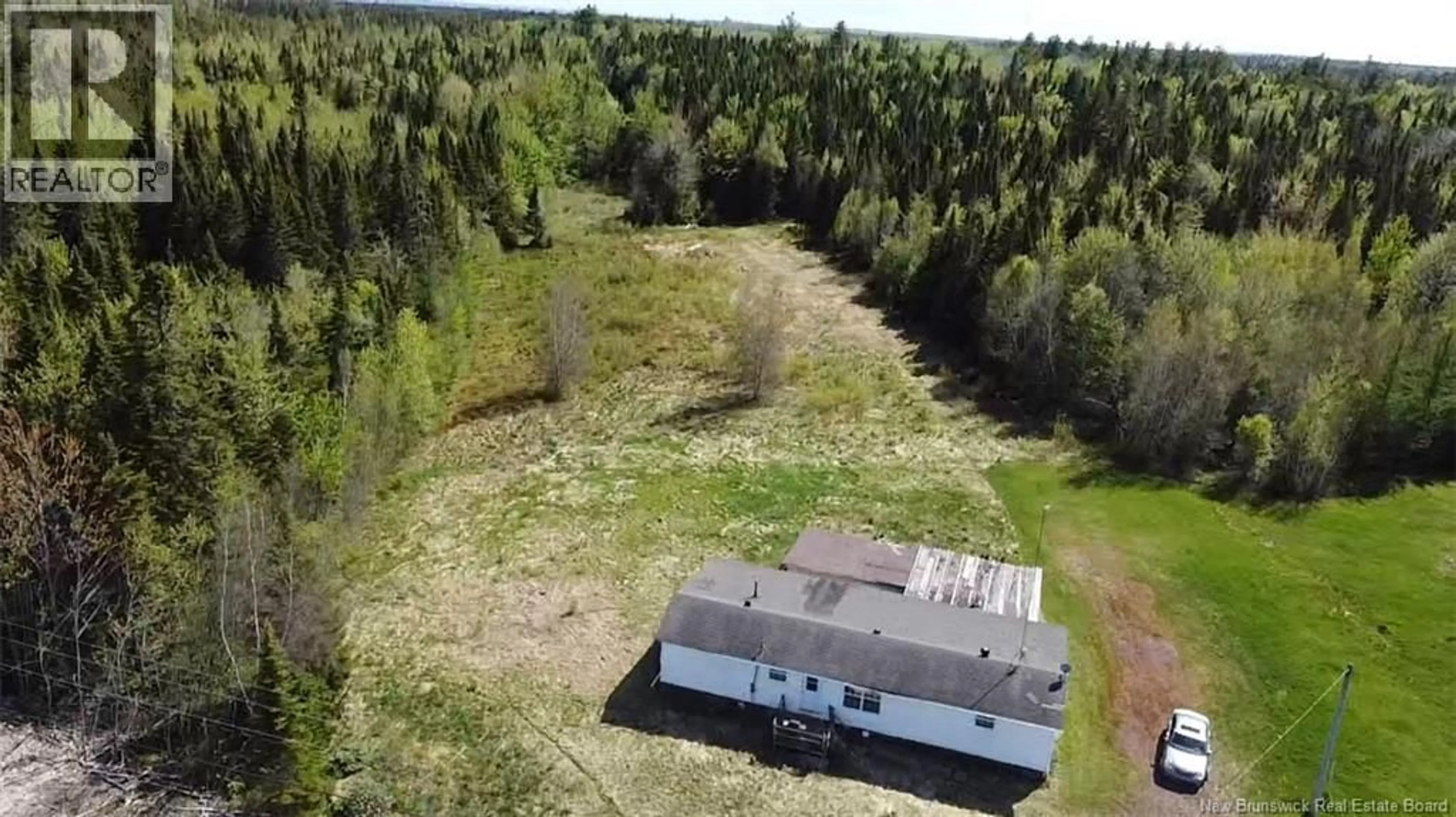 A pic from outside/outdoor area/front of a property/back of a property/a pic from drone, forest/trees view for 6762 ROUTE 10, Upper Salmon Creek New Brunswick E4A1J1