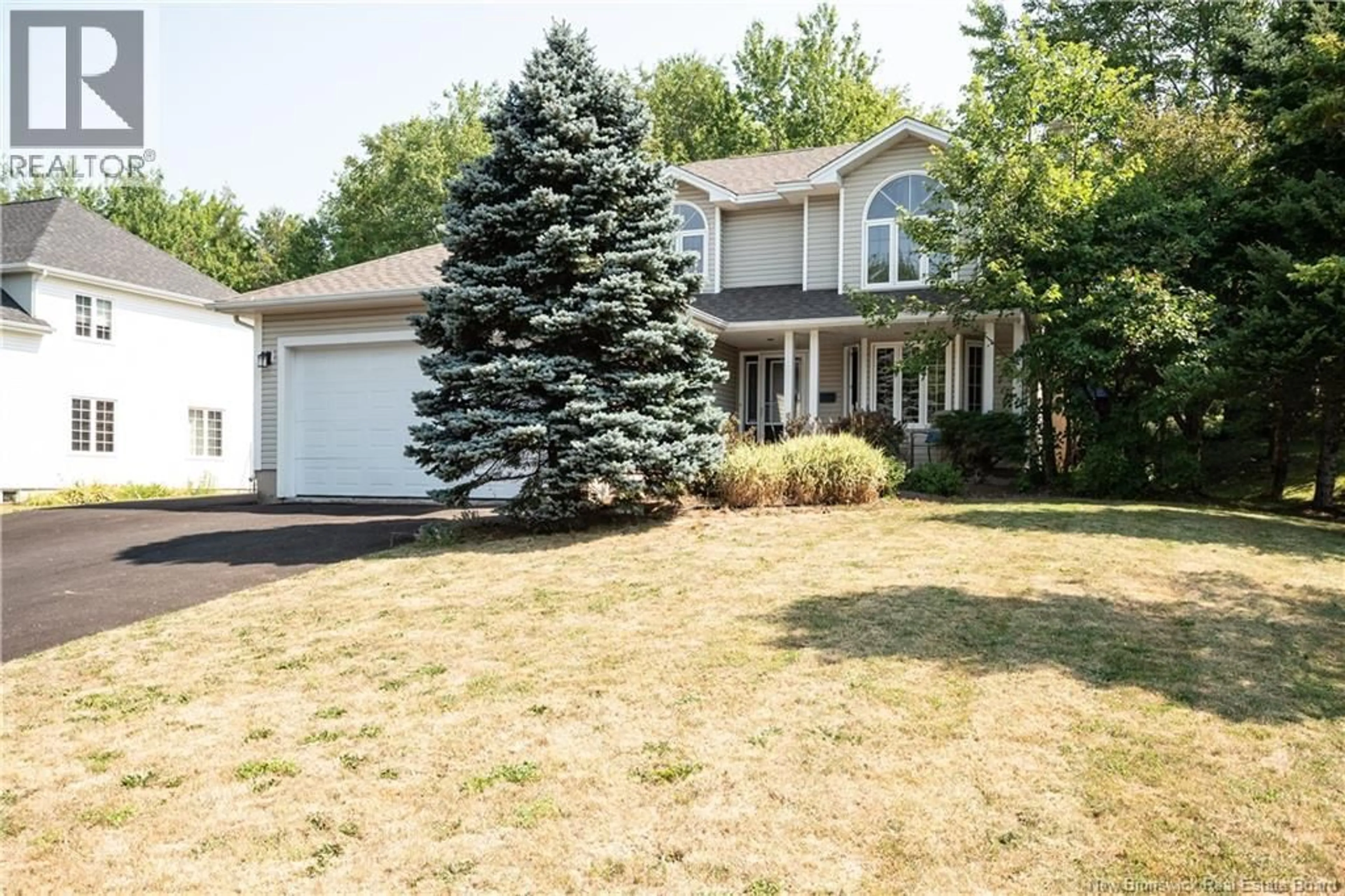 Home with vinyl exterior material, street for 604 GREGOIRE, Dieppe New Brunswick E1A6H9